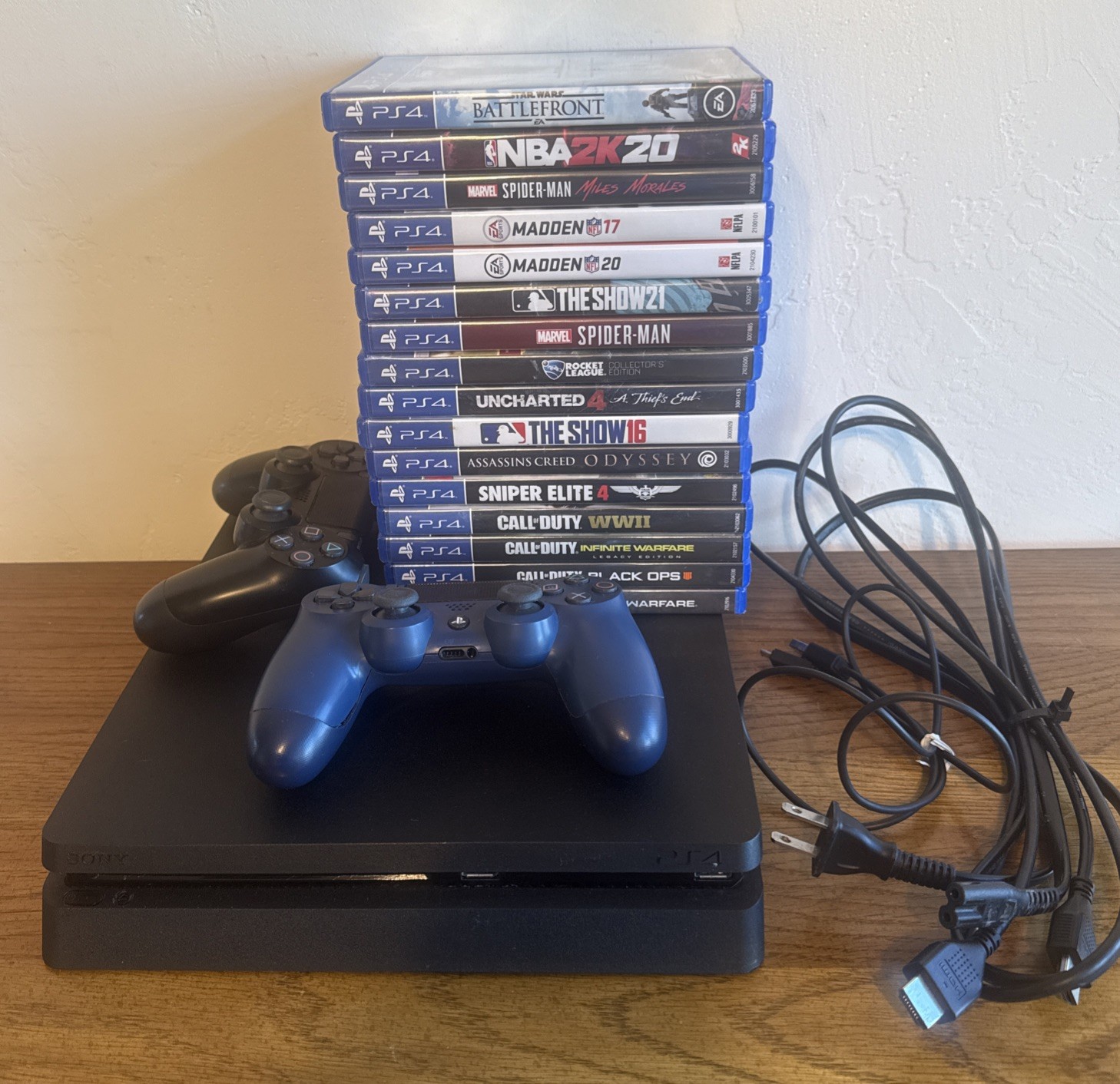 Sony PlayStation 4 Slim 1TB Black Console Bundle 16 Games 2 Remotes Cords Reset