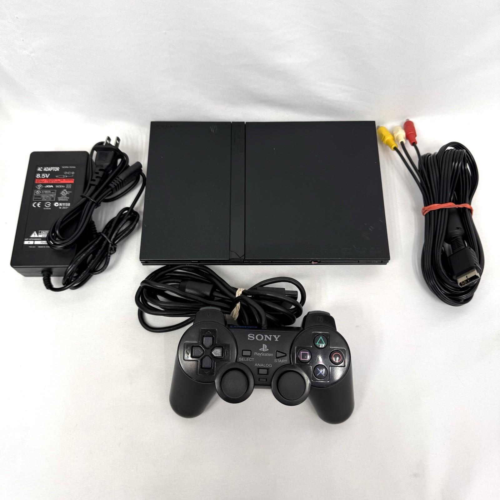 PlayStation 2 PS2 Slim SCPH-77001 Console w/ OEM Controller, Power and AV Cables