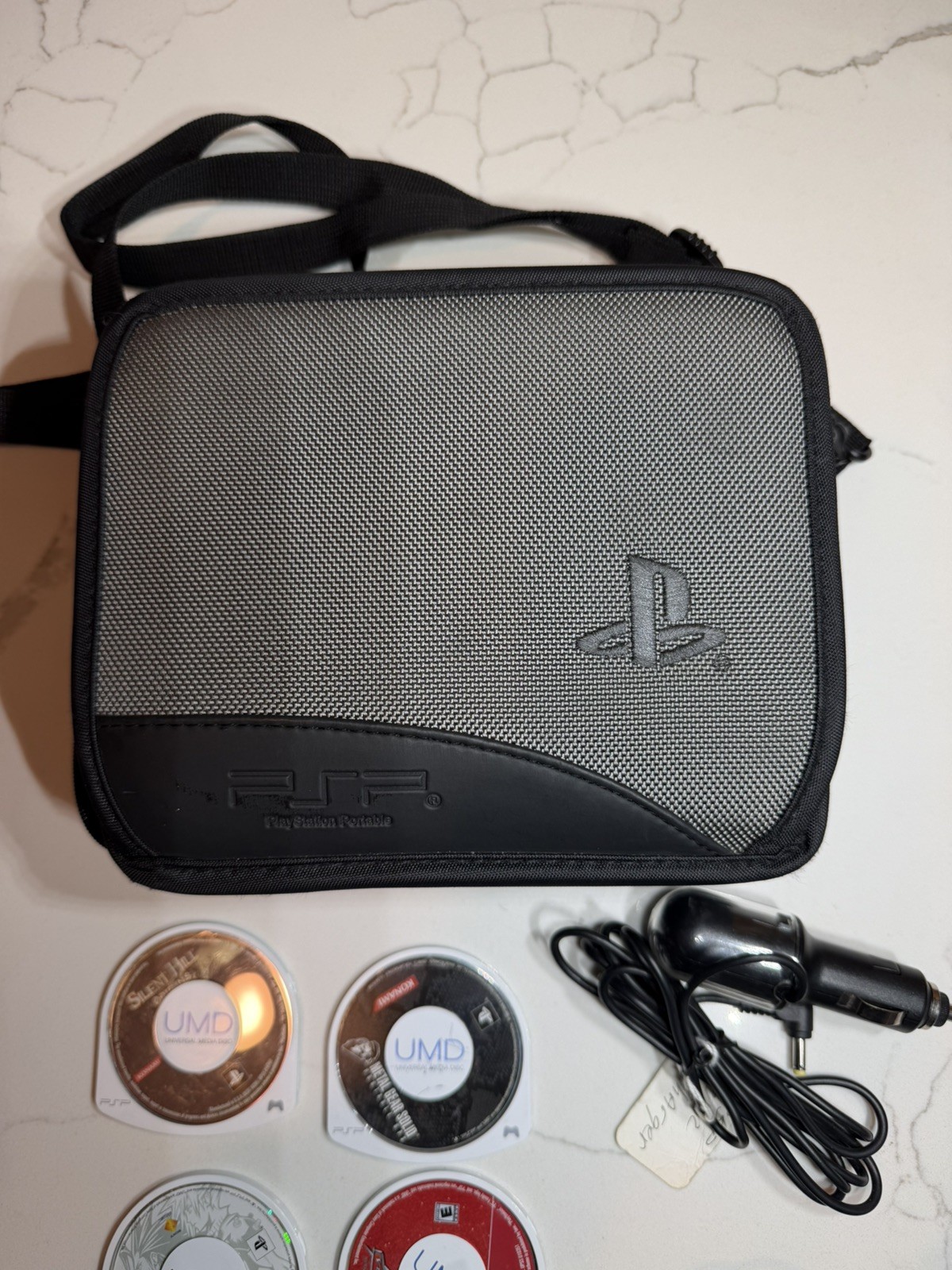 Sony PSP-1001 PlayStation Portable – Black w/ Games + Case + Cables