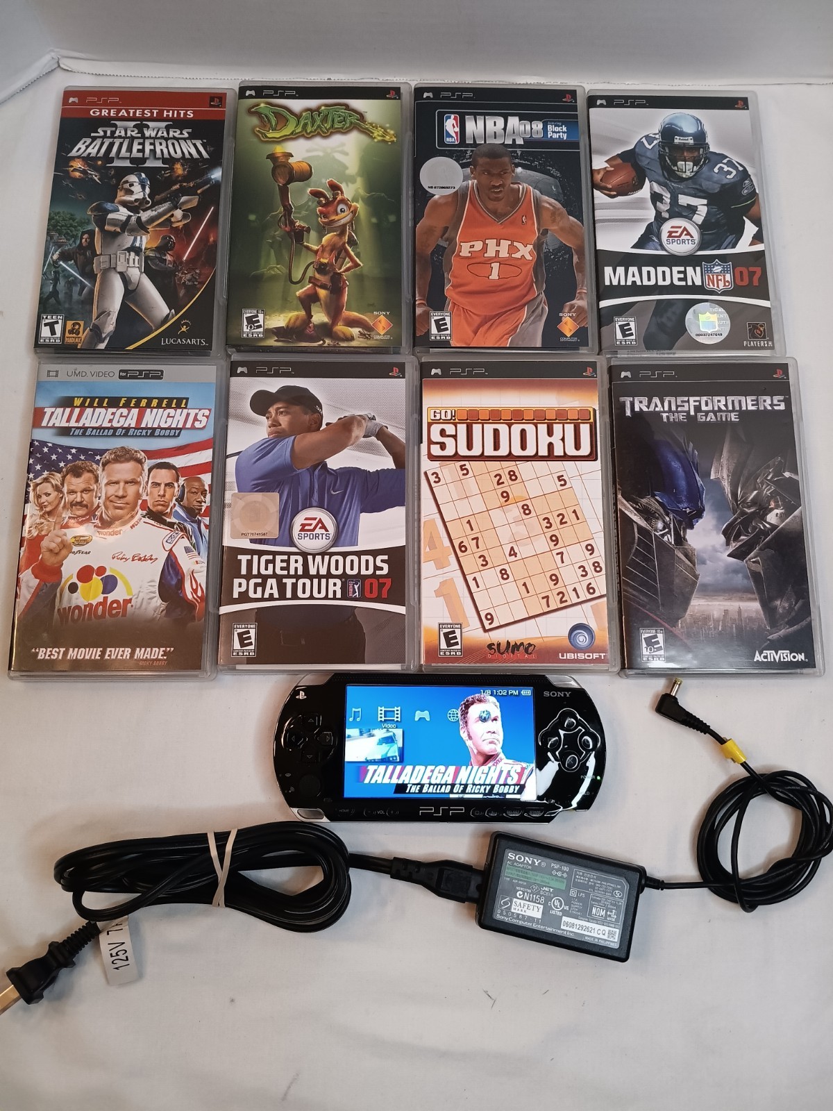 Sony PSP-1001 Black PlayStation Portable Console w/ 8 Games Movie Charger Tested
