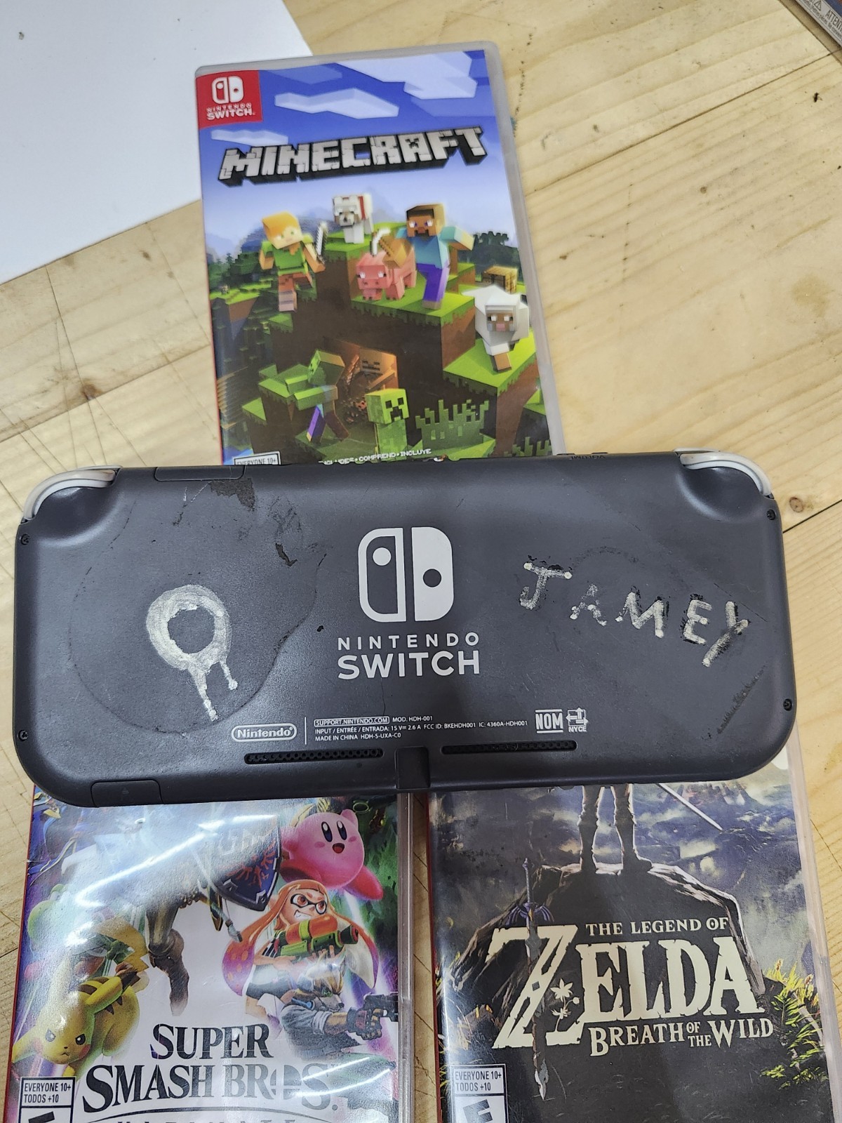 Nintendo Switch Lite Gray With Three Games Zelda Smash Bros Minecraft WORKING