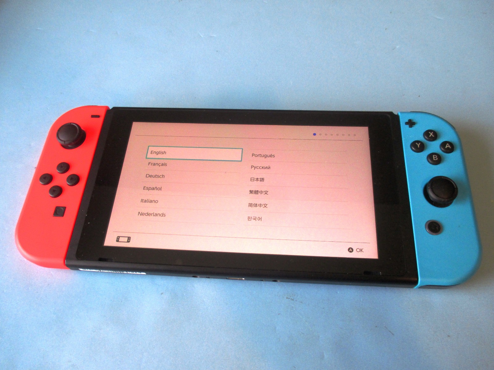 Nintendo Switch System Console w/Neon Red & Blue Joy-Cons + Case & Charger
