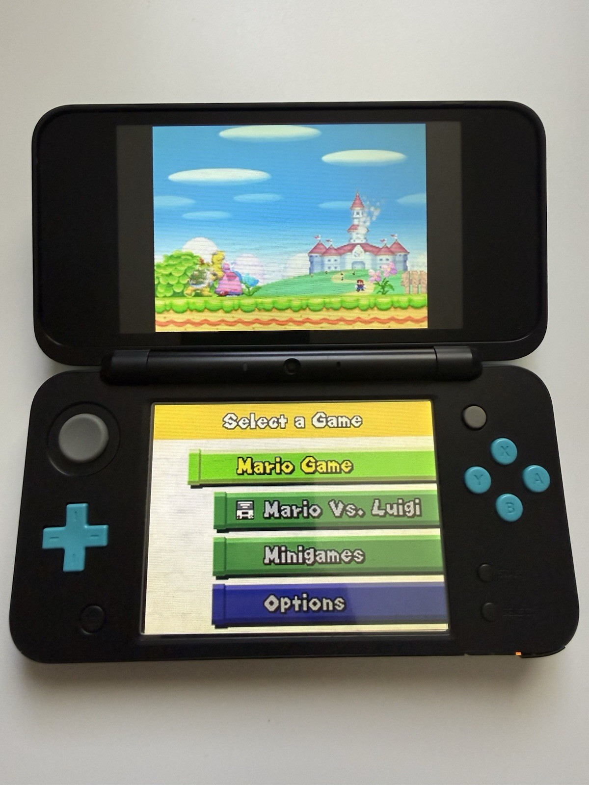 Nintendo 2DS XL LL Black x Turquoise English Region Free 64GB Charger