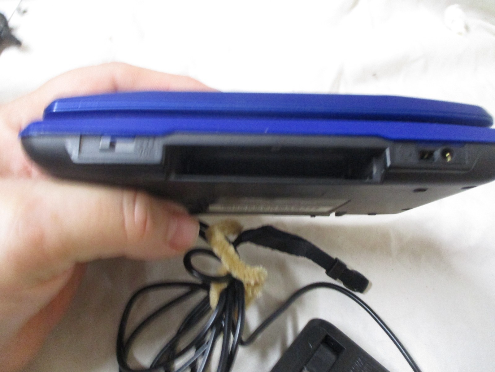 NINTENDO DS BLUE WITH GAMEBOY ADVANCE AND DS ABILITY 1 ARM BROKE