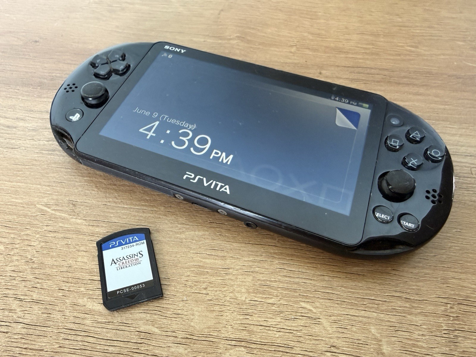 Sony PlayStation PS Vita 2001 w/ Assassins Creed – For Parts – Bad Left Joystick