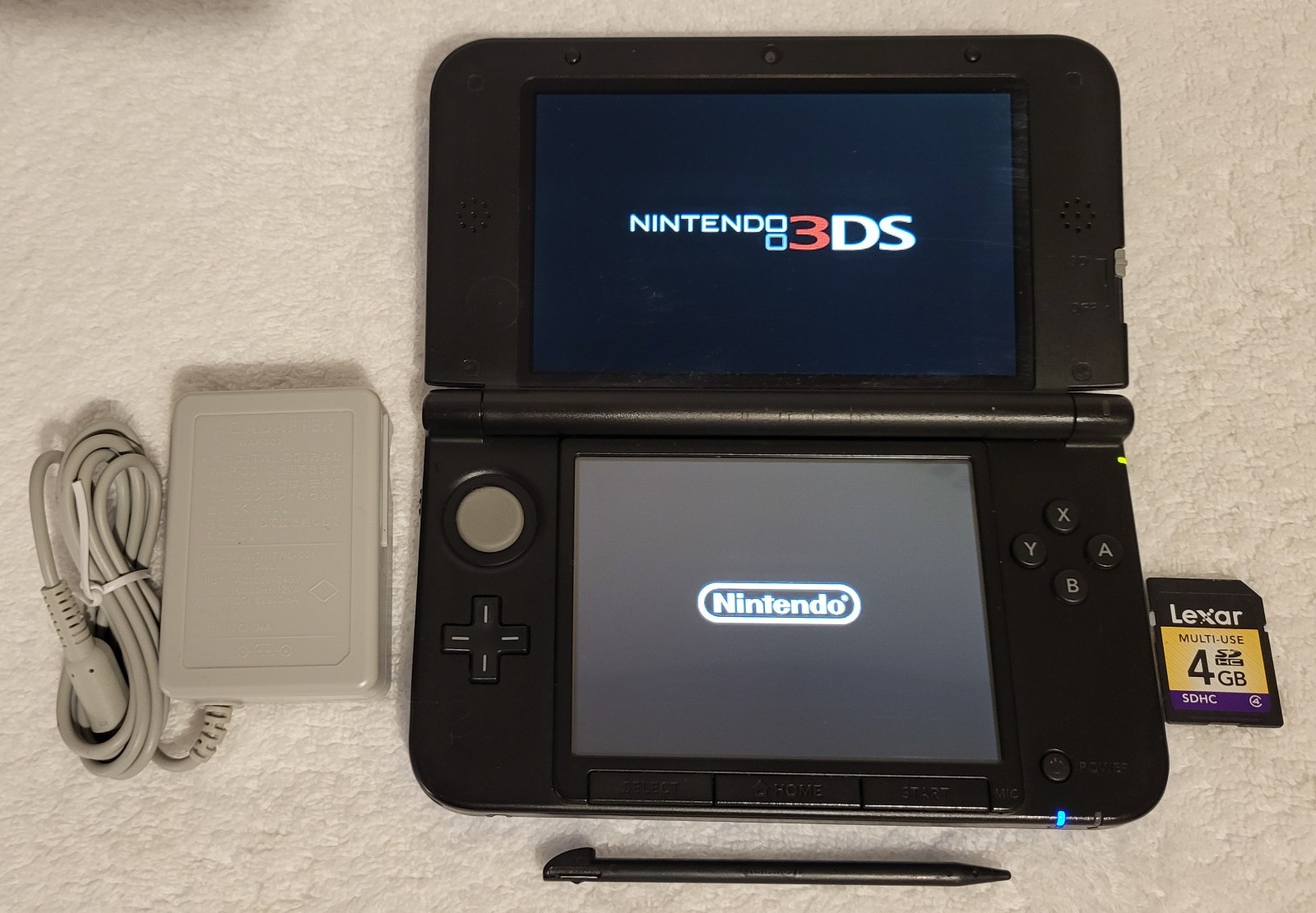 Nintendo 3DS XL Blue & Black Handheld Console System w/ Charger, Stylus, SD Card