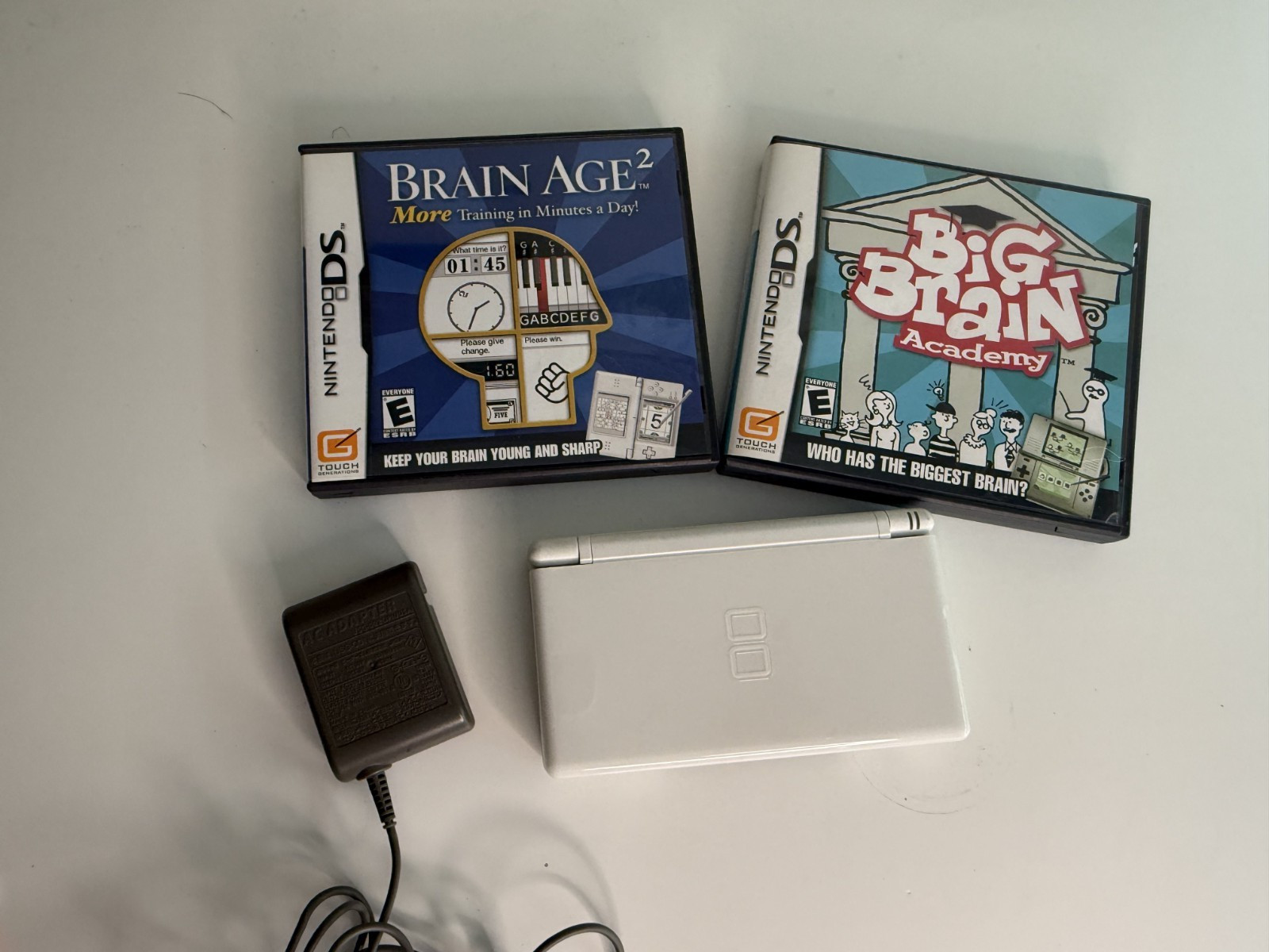Nintendo DS Lite Handheld Console – Polar White Comes with two Games
