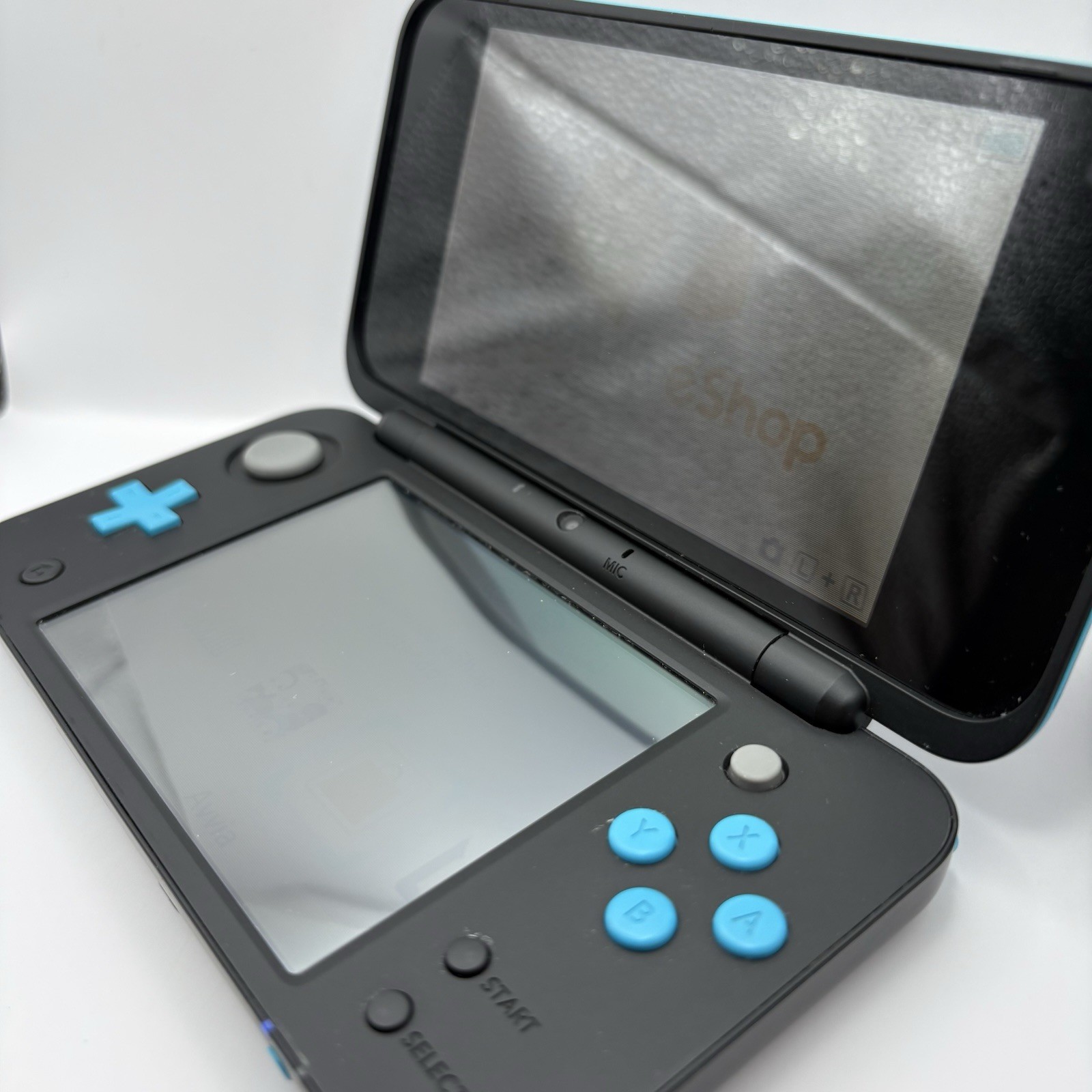 NEW NINTENDO 2DS XL 4GB BOXED – BLACK/TURQUOISE + ACCESSORIES
