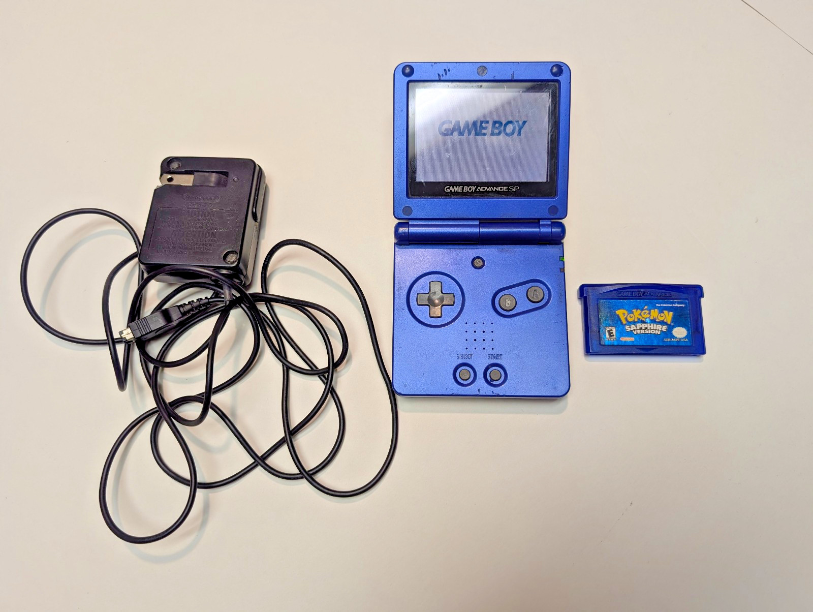Nintendo Gameboy Advance SP Cobalt + Pokémon Sapphire + Official Charger WORKS