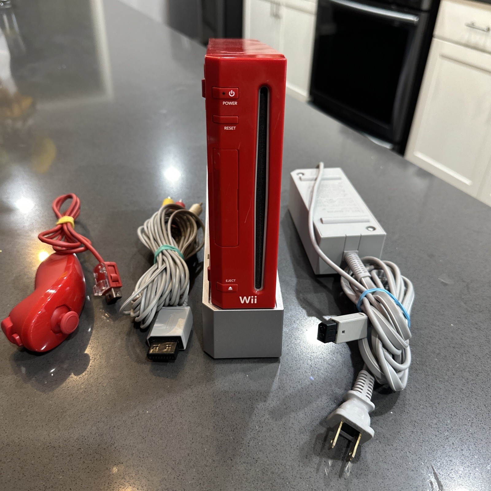 Nintendo Wii Red 25th Anniv Ed. RVL-001 Console, power supply, ac and nunchuck