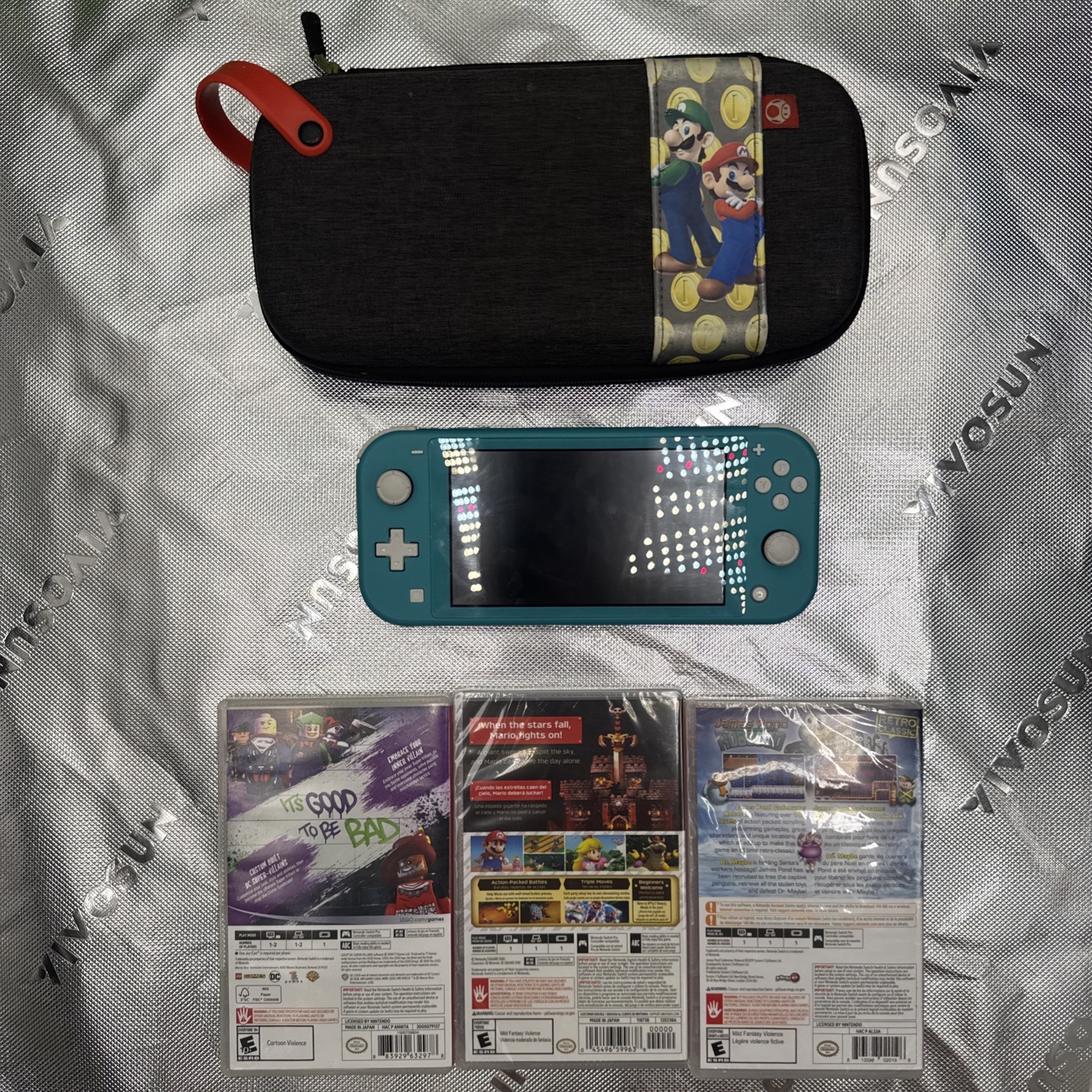 Nintendo Switch Lite 32GB Turquoise Handheld Gaming Console W/3 Games Mario Case