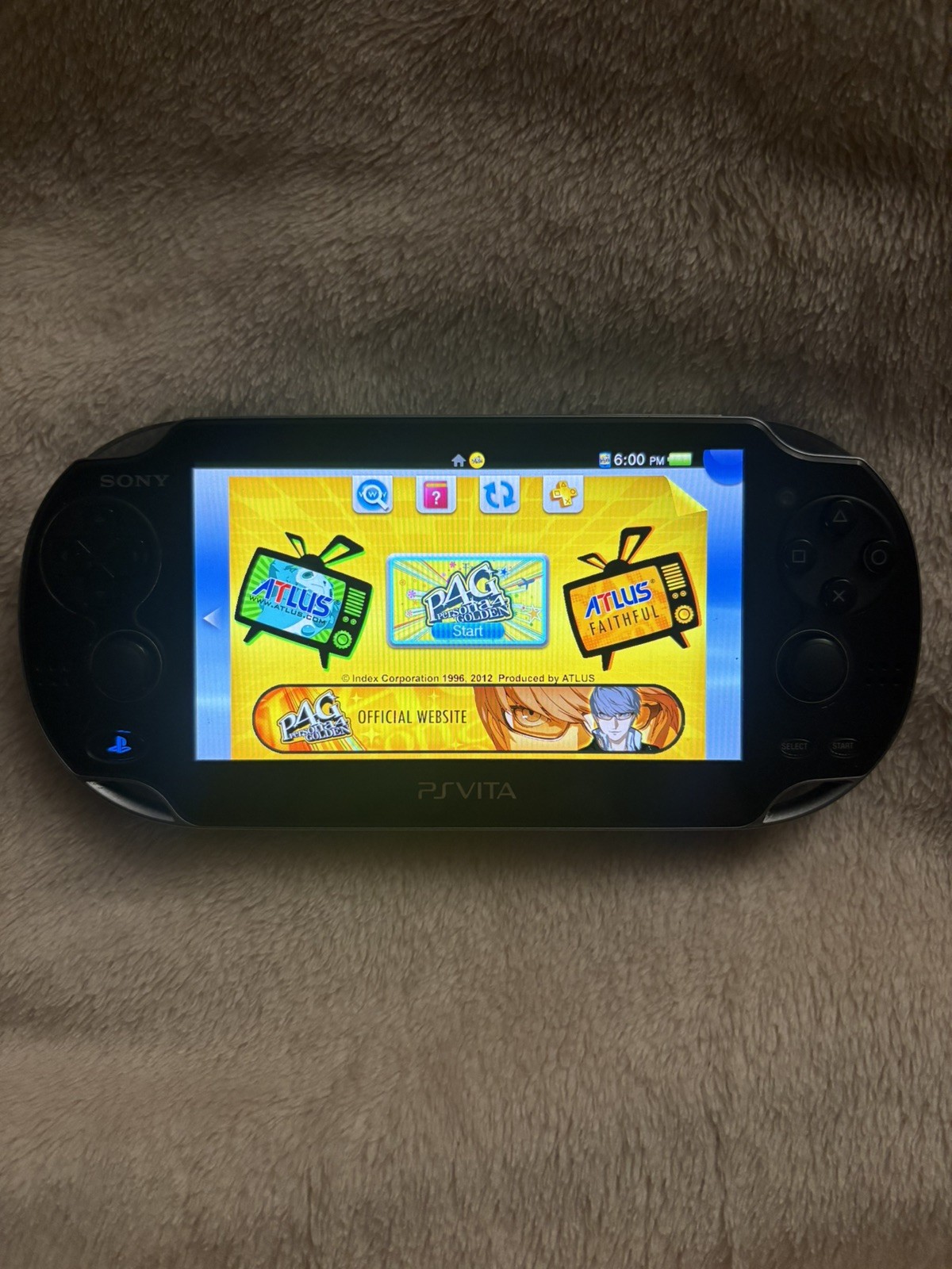 PlayStation Vita – Carrying Case and Persona 4 Golden Included