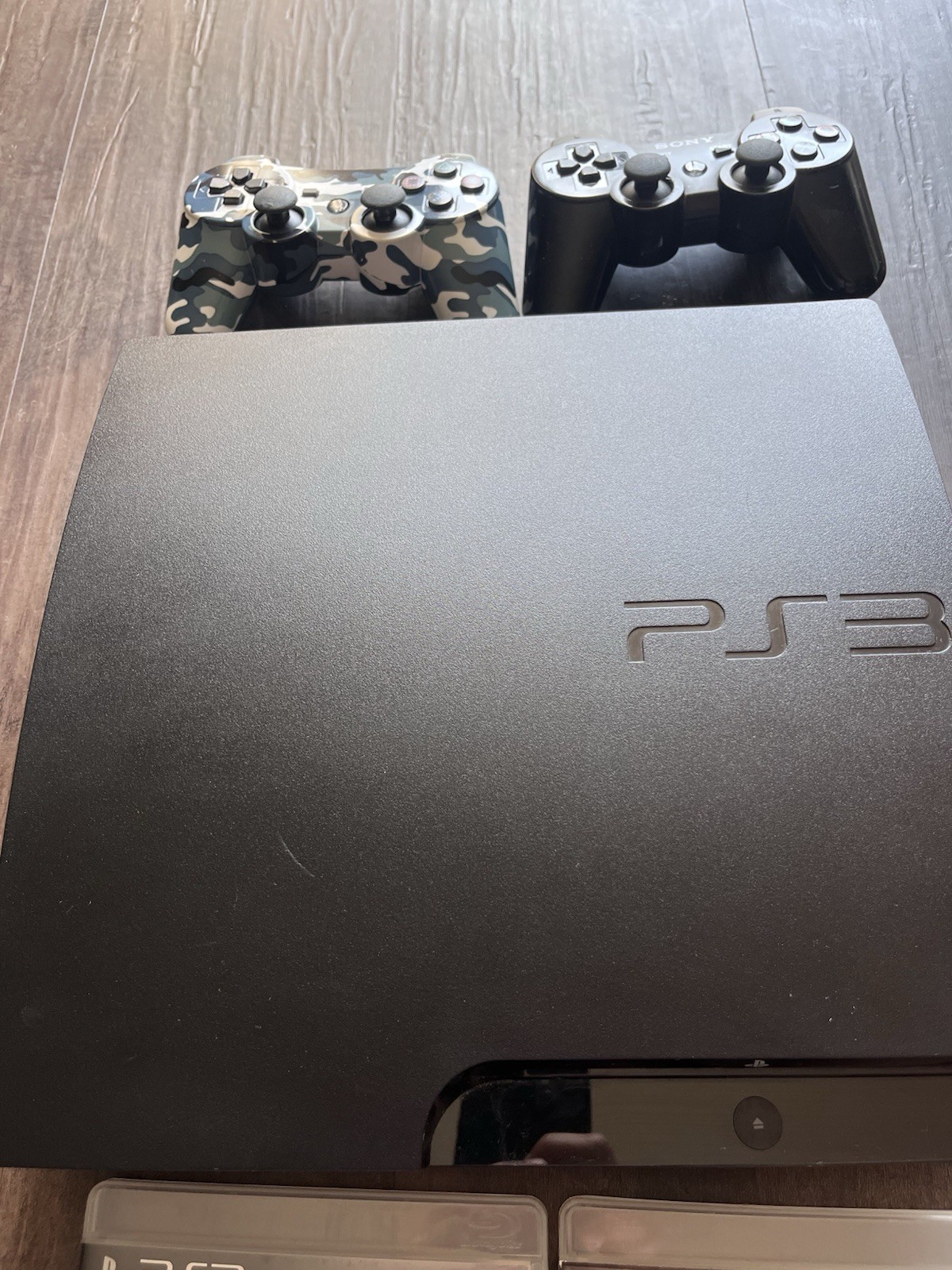 PlayStation 3 Slim 320gb tested and working With Games