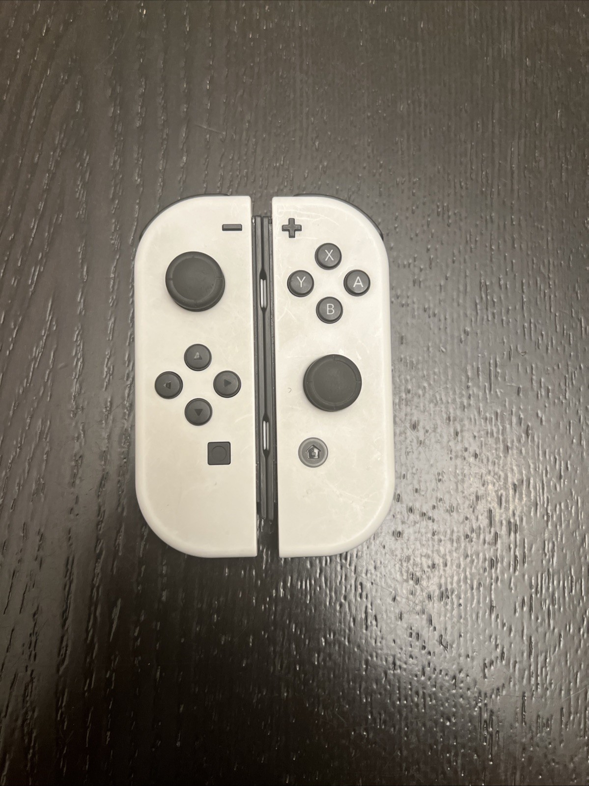 Nintendo Switch White OLED With Custom LED Controllers.Dock and charger included