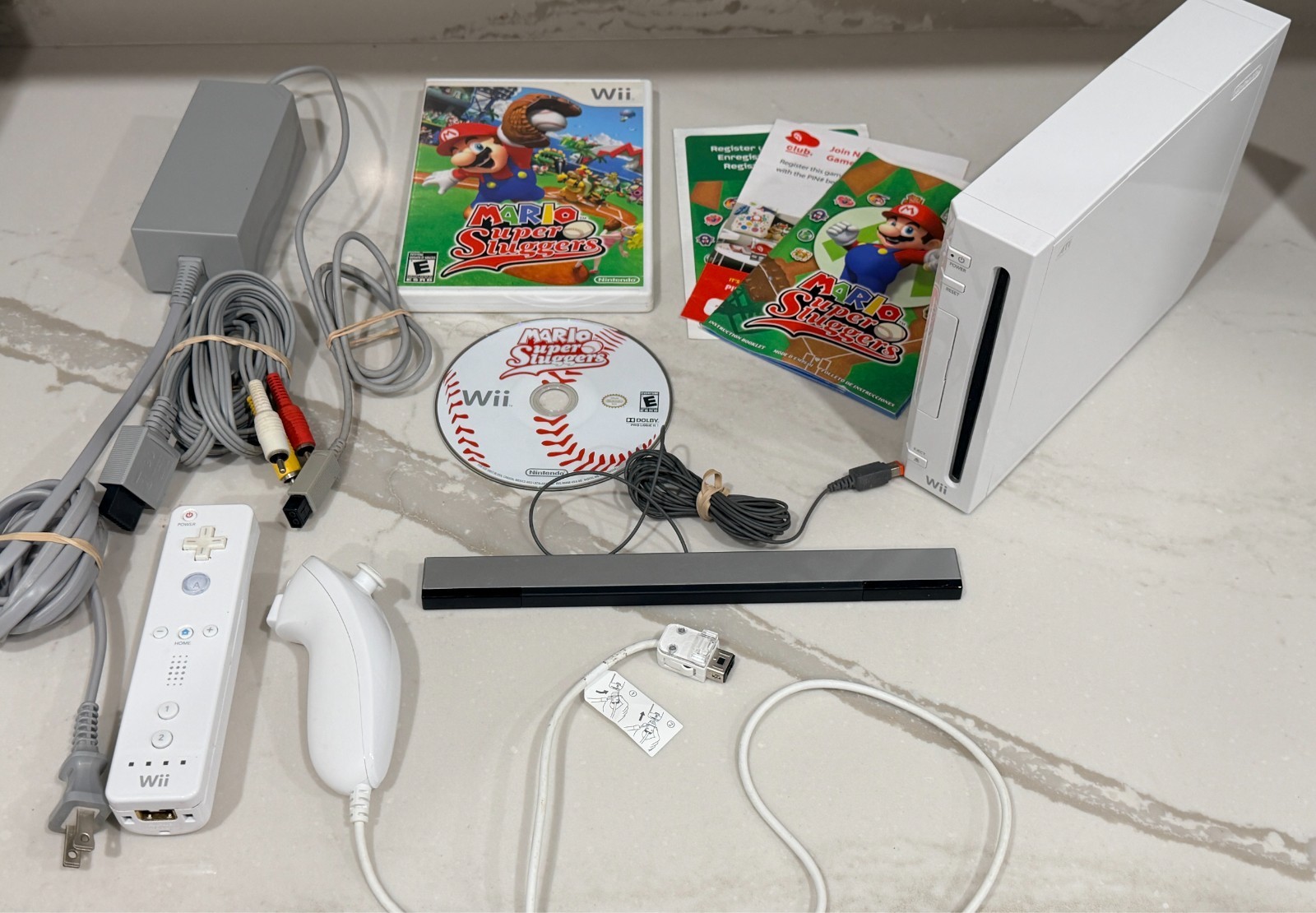 Nintendo Wii Console with Wii Remote, Nunchuck, Wires, Super Mario Sluggers Game