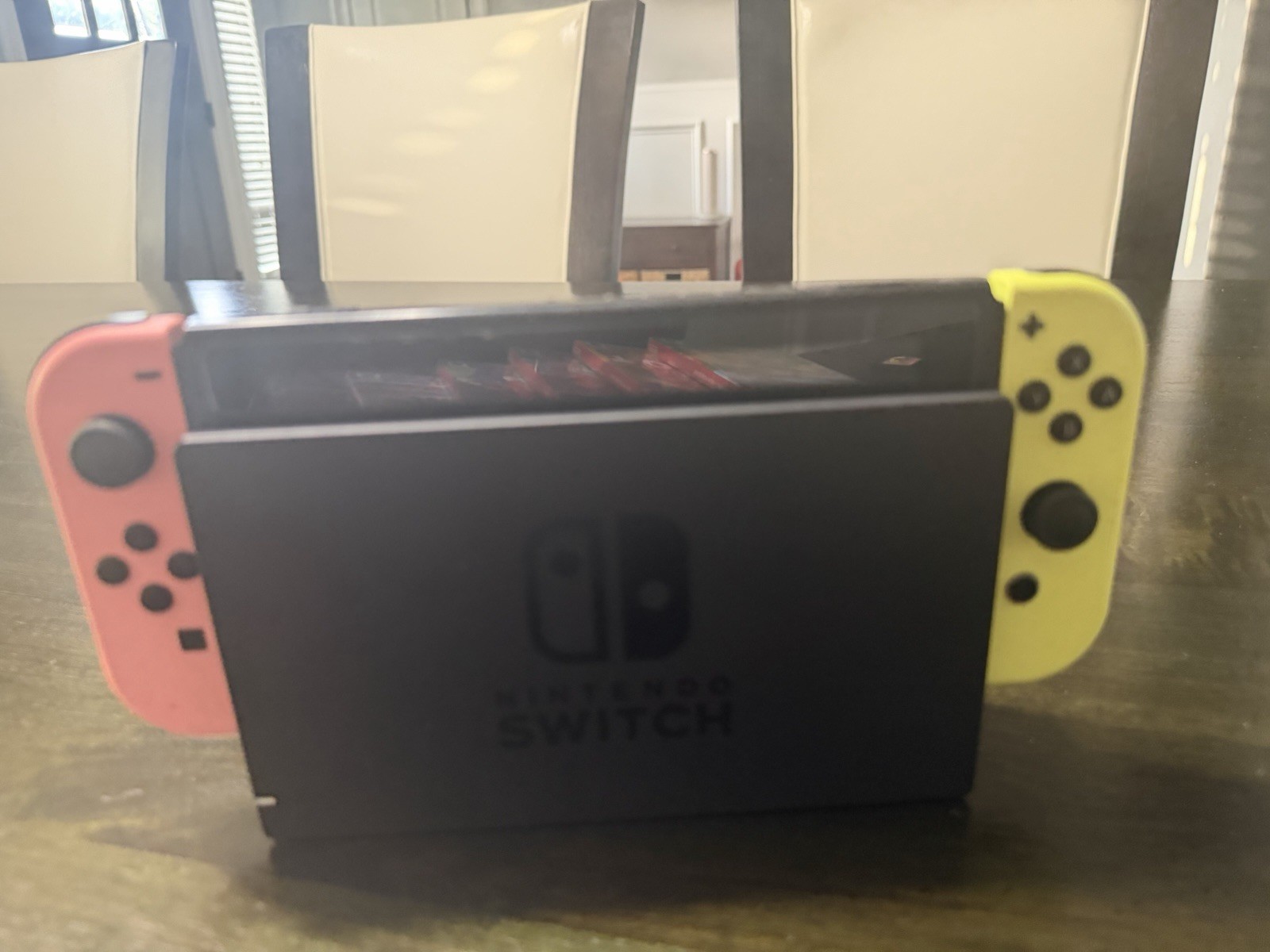 Nintendo switch + Controllers and Games (READ DESC)