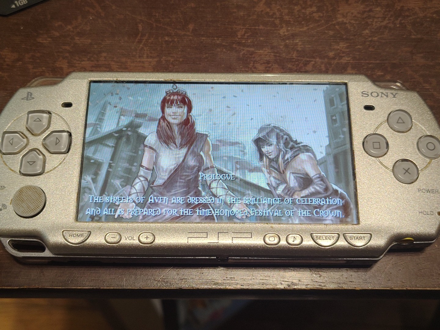 PSP 2001 Silver + 4 Games, 1Gb Memory Stick, Case And Charger