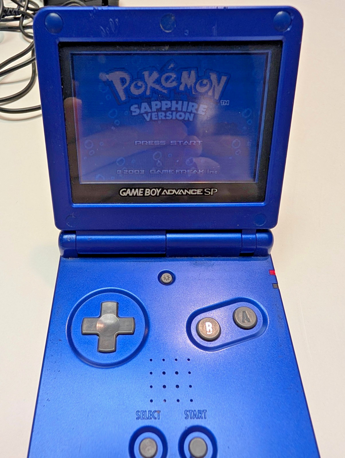 Nintendo Gameboy Advance SP Cobalt + Pokémon Sapphire + Official Charger WORKS
