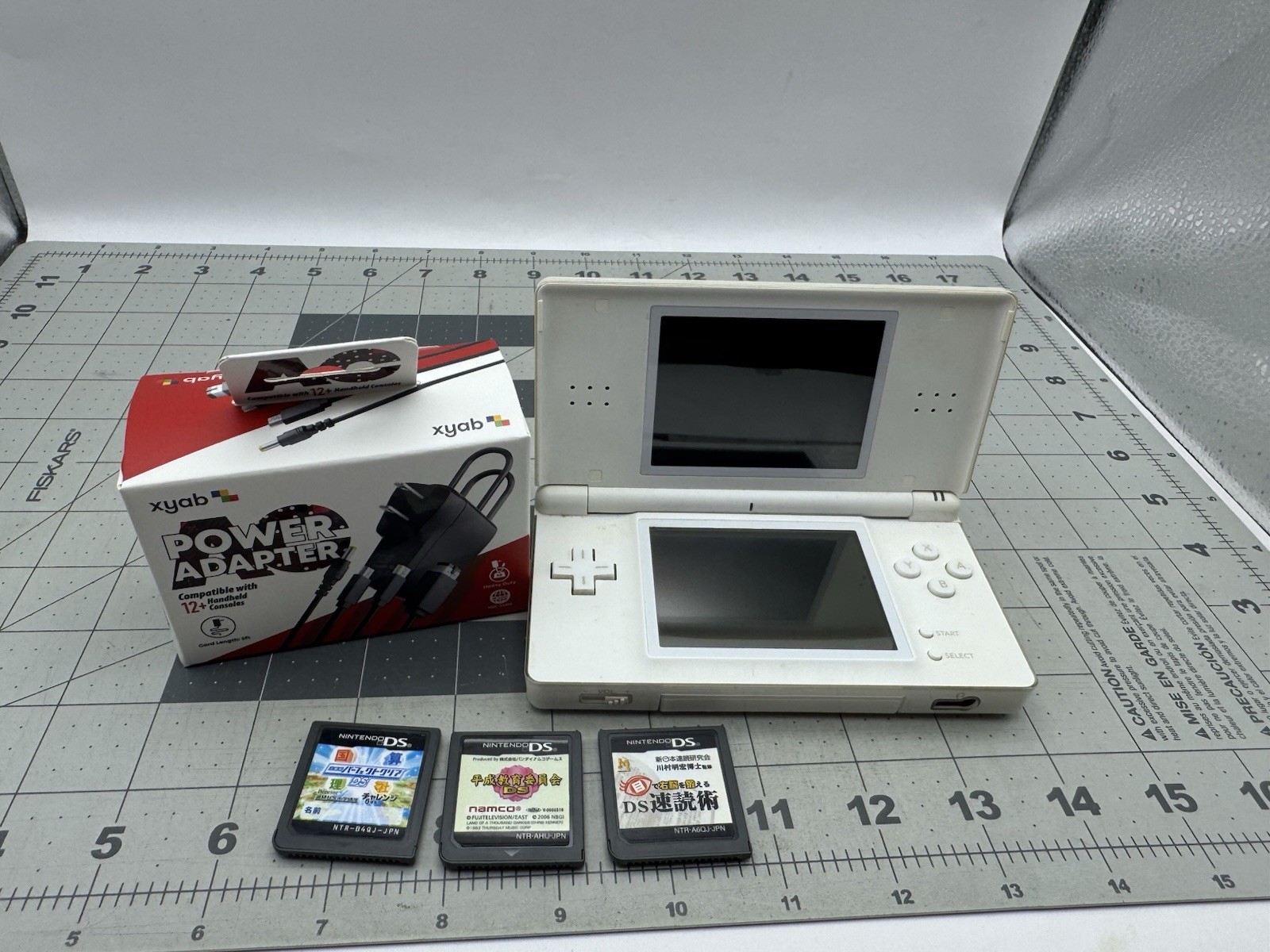 Nintendo DS Lite Console White Japanese With Universal Charger & 3 Games