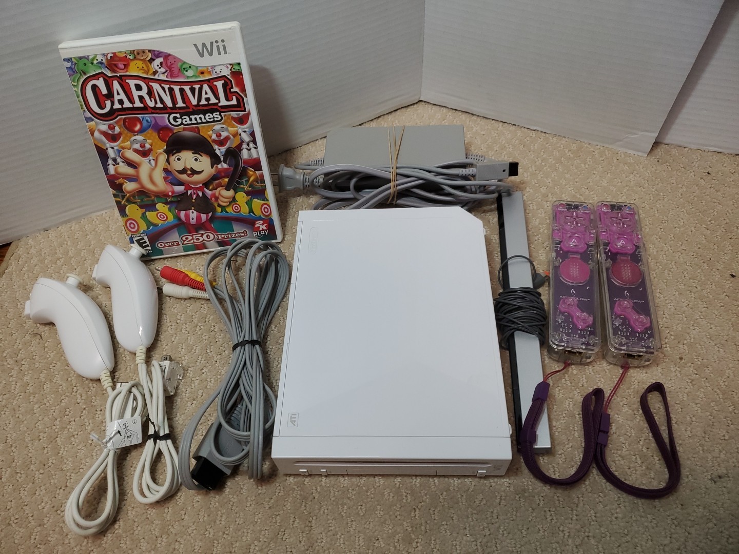 Nintendo Wii Game Console + 2 Controls- 2 Nunchuck, Wii Carnival & More