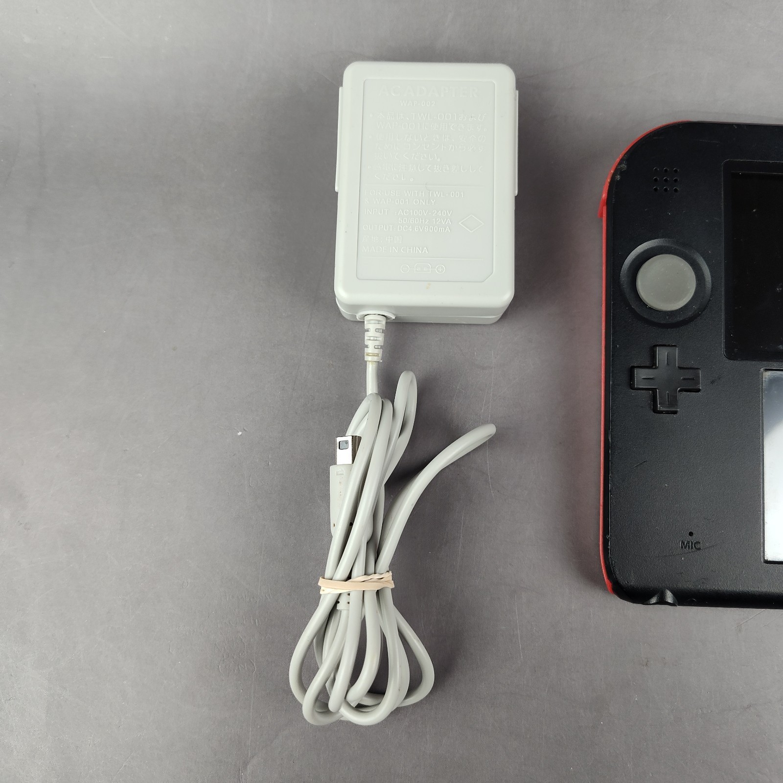 Nintendo 2DS Black/Red Handheld Console w/ Charger, Stylus, and 4 Games Tested
