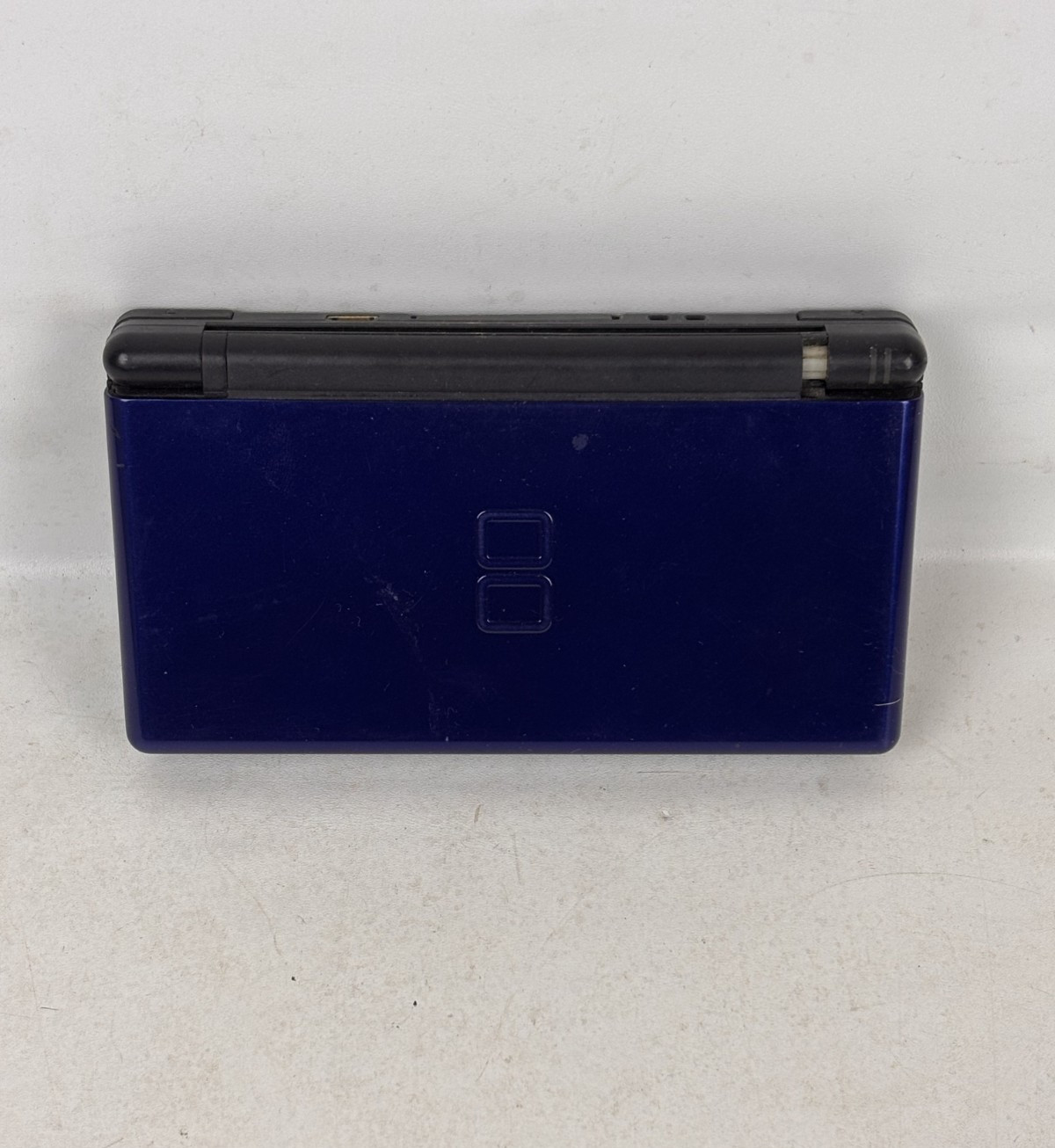 Working Blue Nintendo DS Lite – No Charger or Stylus Included – Needs Tightened