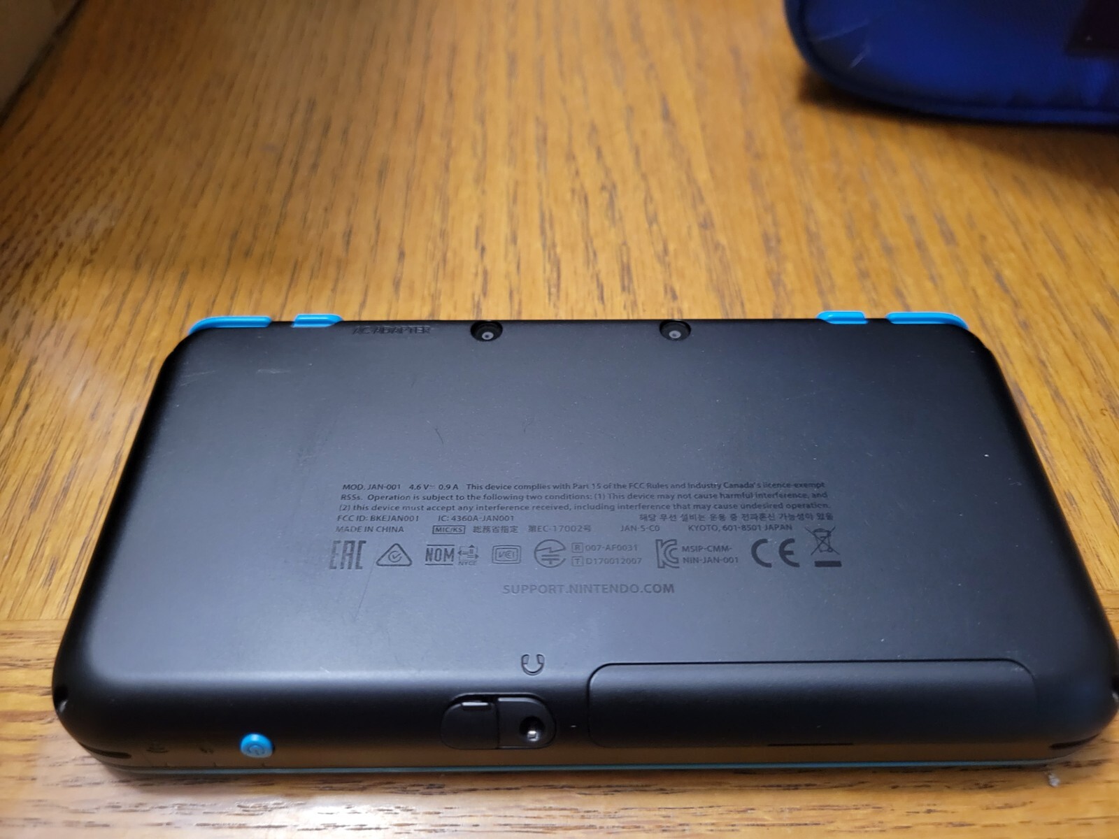 Nintendo 2DS XL Black/Turquoise Console, Accessories, and Games Set