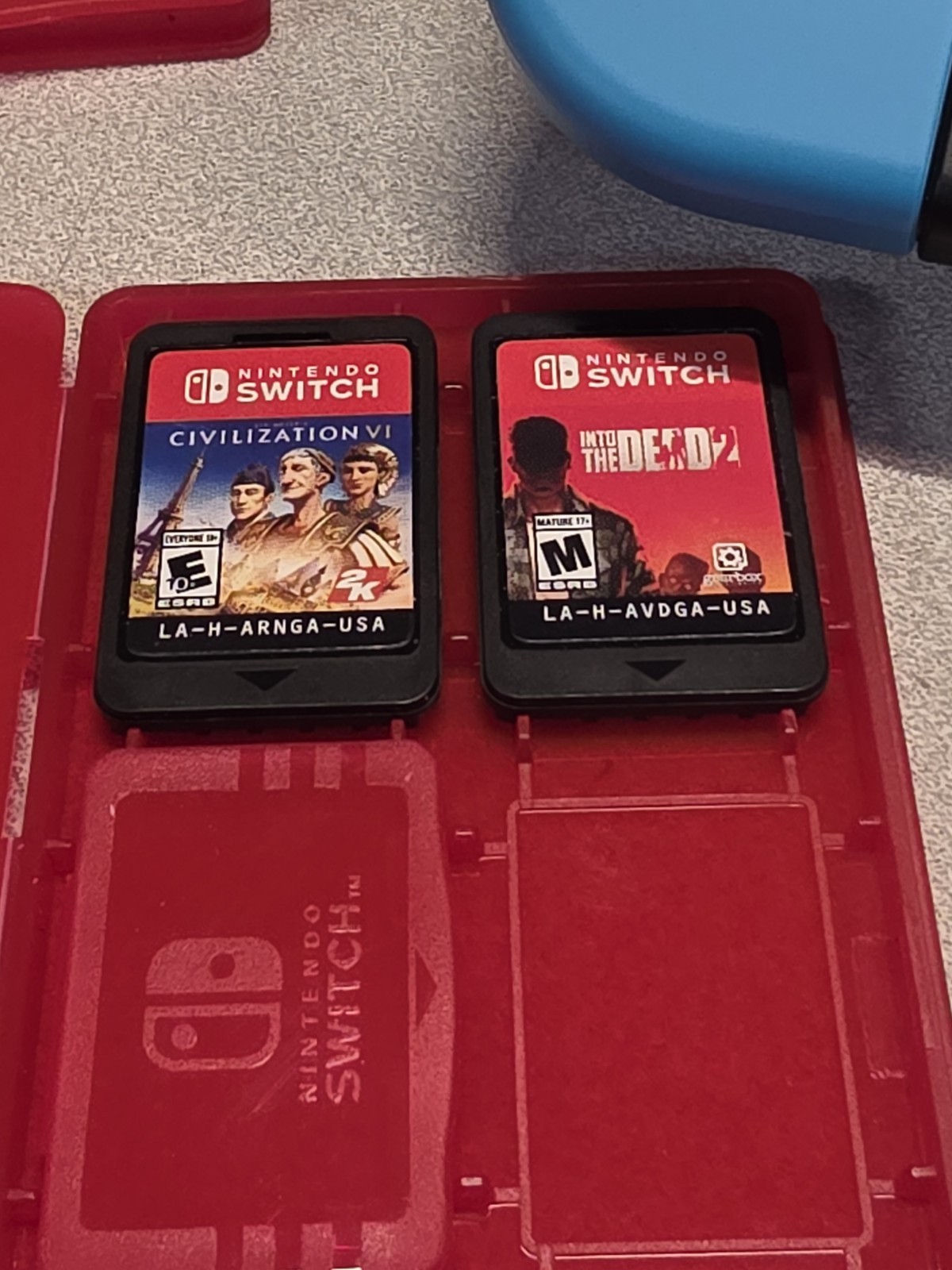 Nintendo Switch Console Red/ Blue w/ case & 3 Games