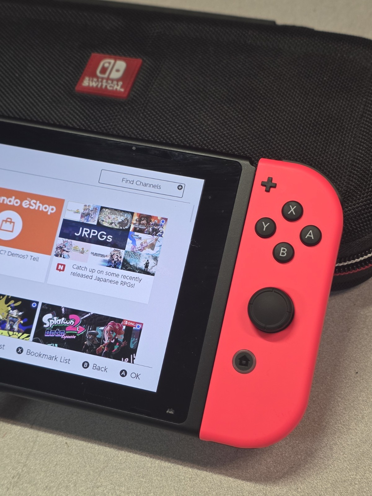 Nintendo Switch Console Red/ Blue w/ case & 3 Games