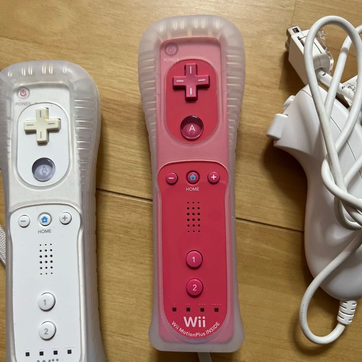 Nintendo Wii console with Wii Party bundle, Nunchuk included, and 3 other games.