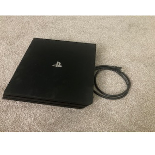 Black Play Station 4 Pro with one Controller and Charger