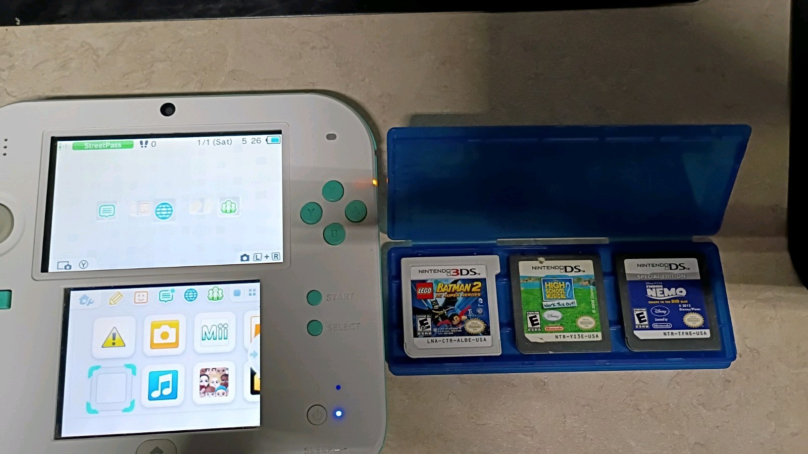 Nintendo 2DS Greenand white Console with 3 games