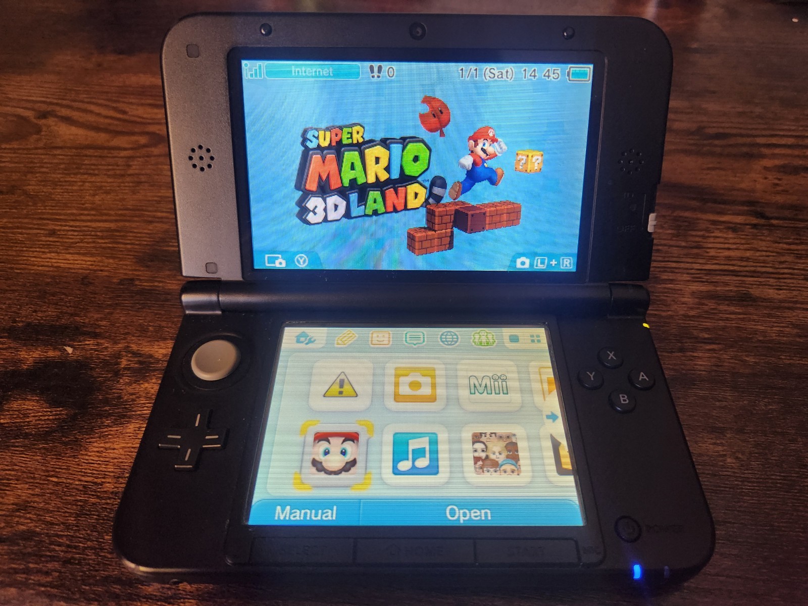 Nintendo 3DS XL Blue with Super Mario 3D Land