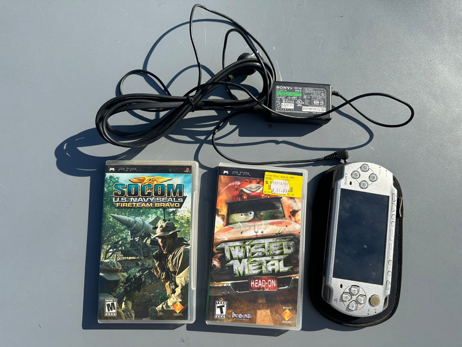 Sony PSP-2001 Silver Console w/New Battery/Charger + 3 UMDs TESTED WORKS 4 GB