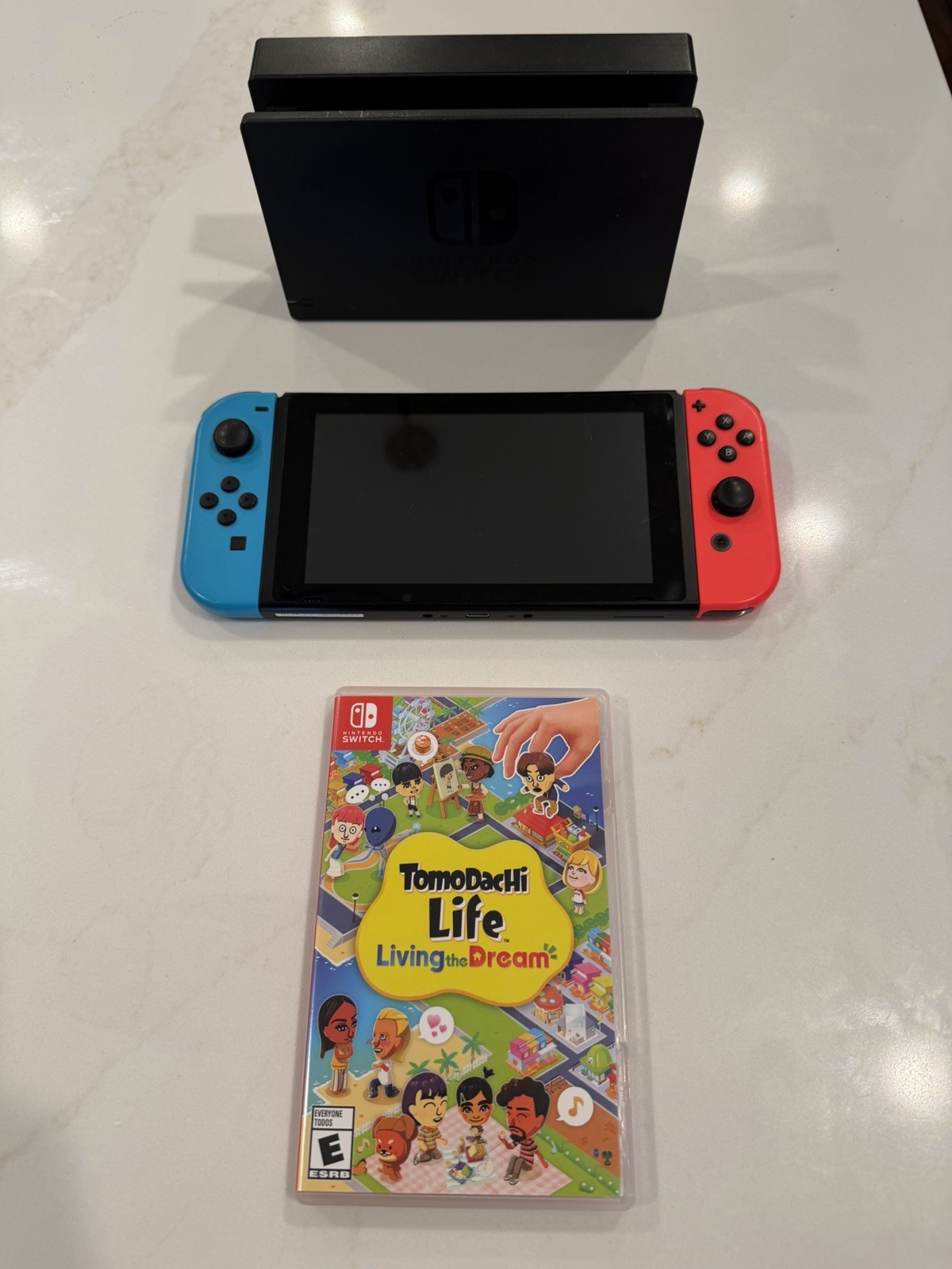 Nintendo Switch 32GB Handheld Console – Neon Red/Neon Blue With Tomodachi Life