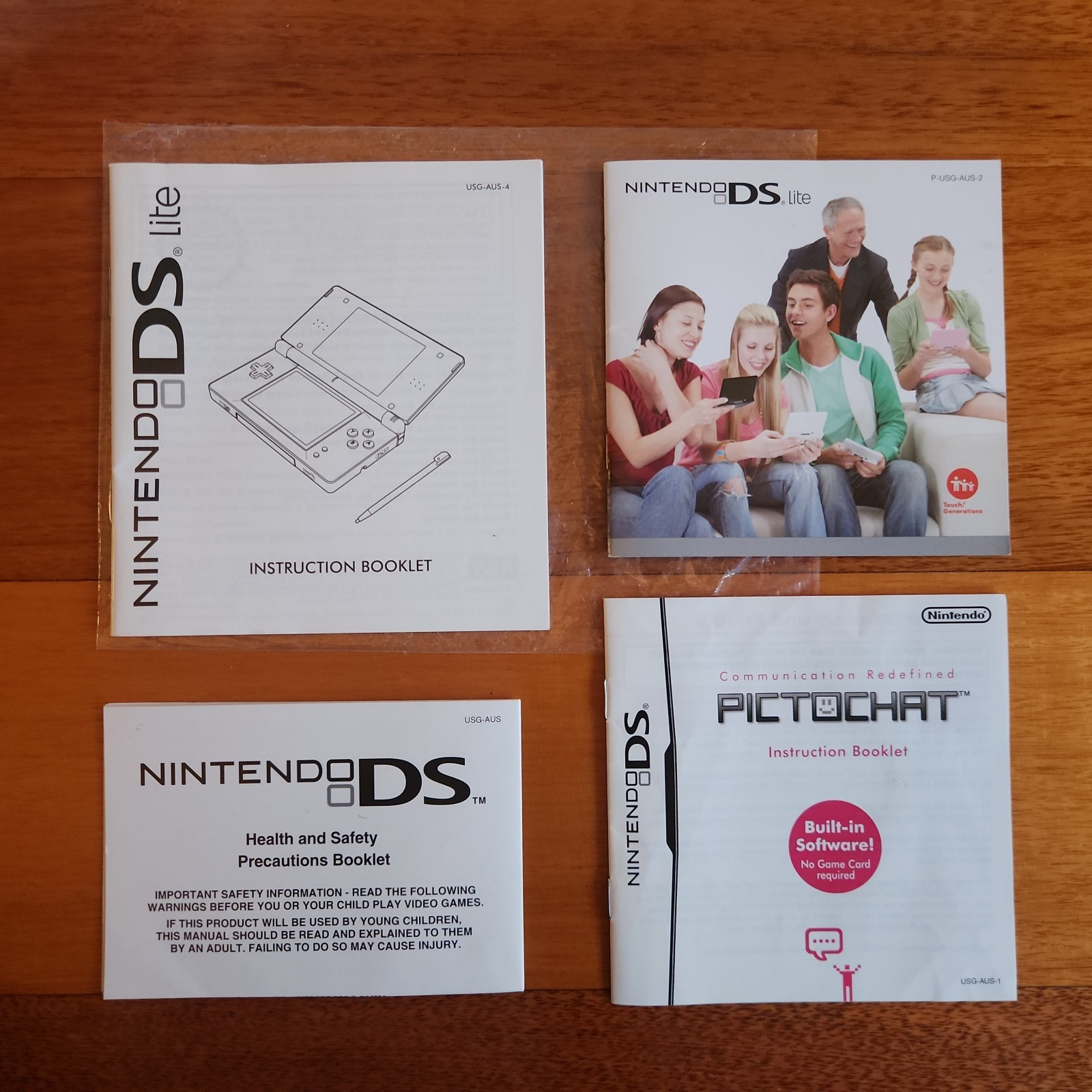 Nintendo DS Lite Red/Black boxed /w insert, manuals and accessories – Aust model