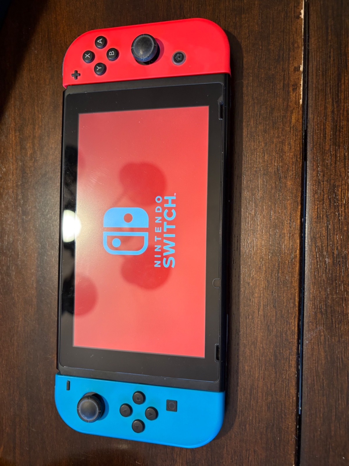 Nintendo Switch 32GB – Neon Red/Neon Blue (w/ 128 MicroSD card)