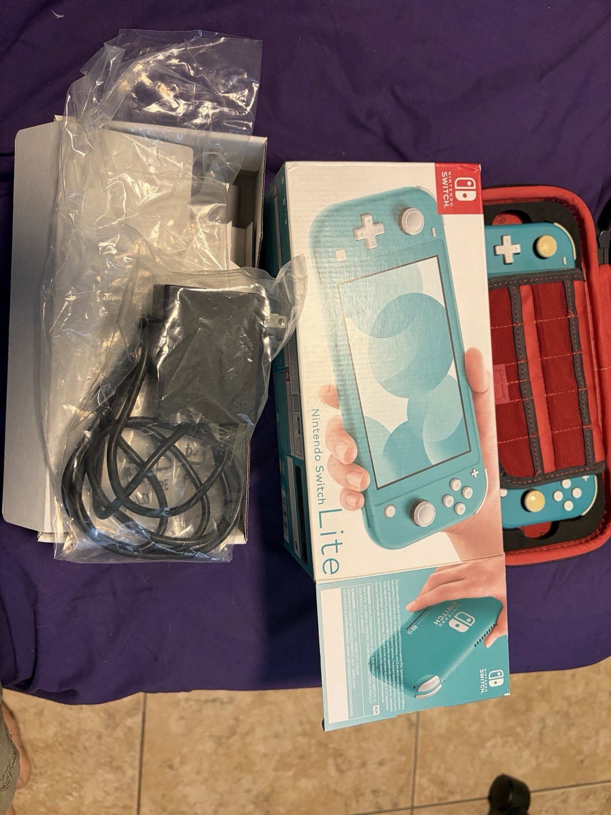 Nintendo Switch Lite 32GB Console – Turquoise With SD Card And Carry Case