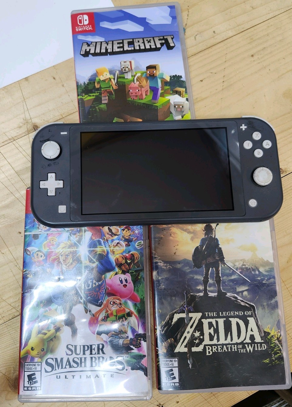 Nintendo Switch Lite Gray With Three Games Zelda Smash Bros Minecraft WORKING