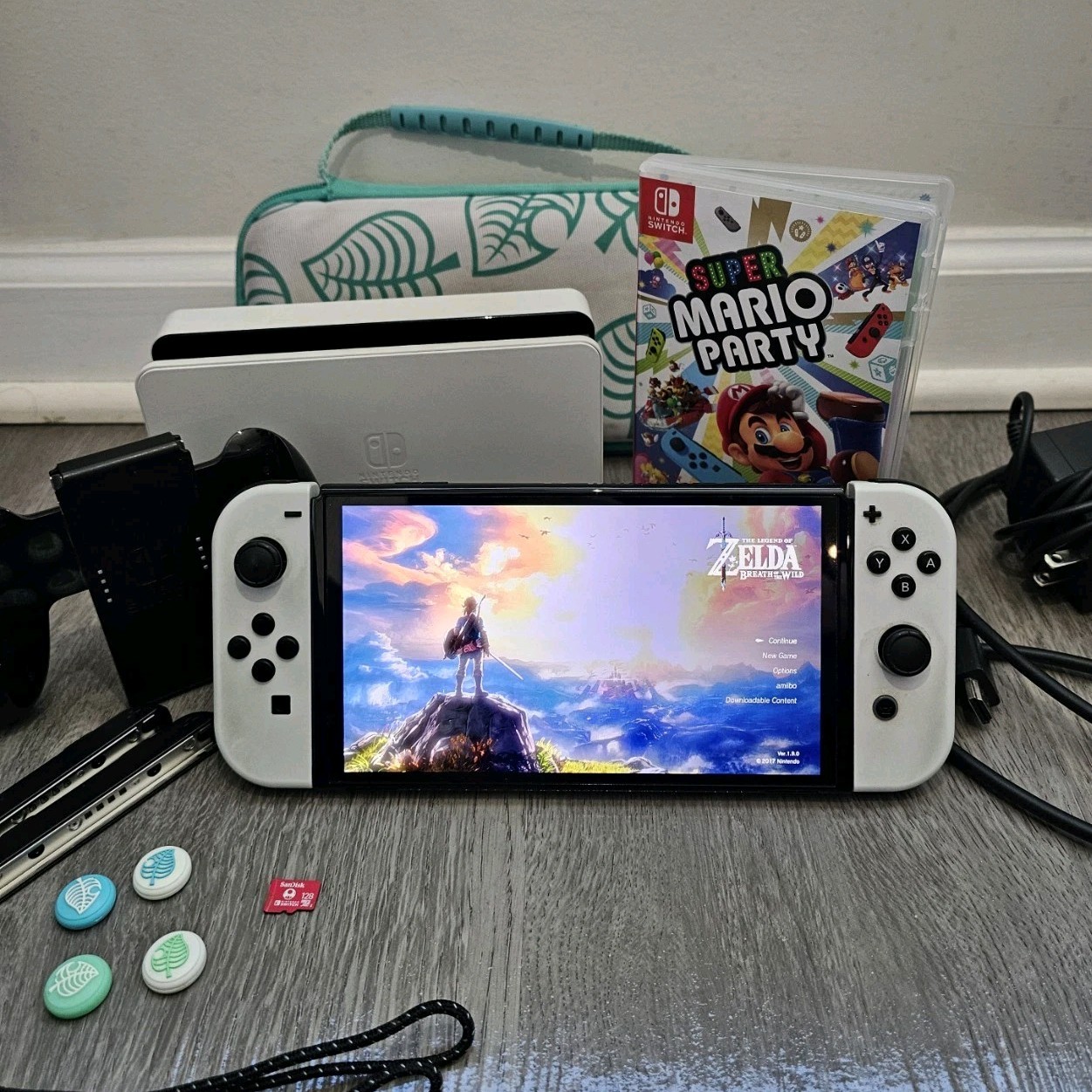 Nintendo Switch OLED white w/ Zelda BOTW, Mario Party, microSD 128GB dock + more