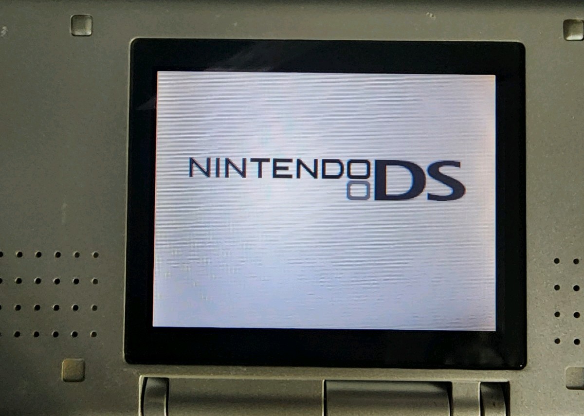 Nintendo DS Silver Black with Charger and 4 games