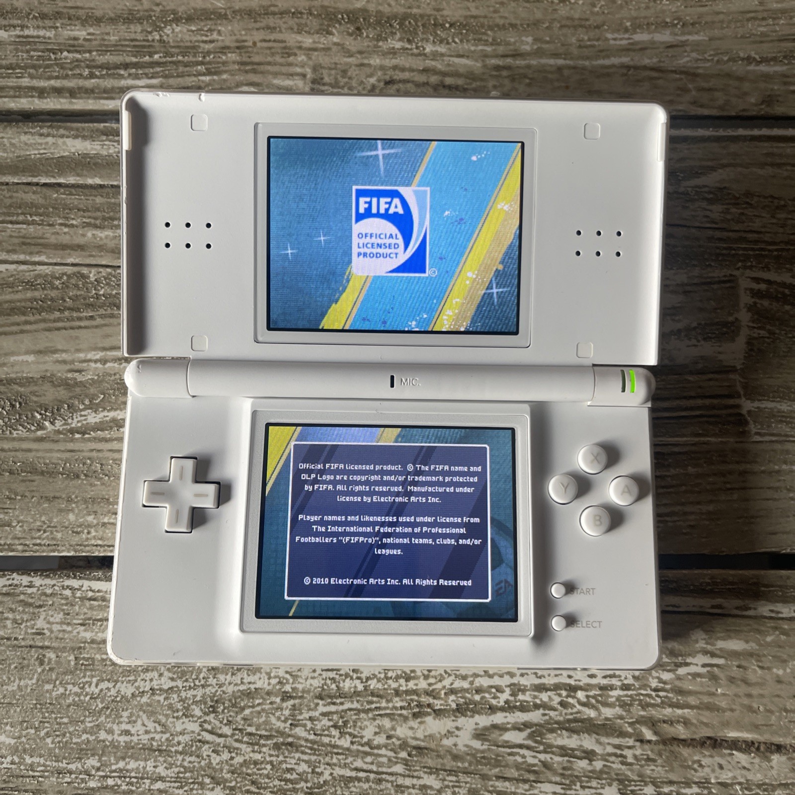 Nintendo DSi Handheld Game Console – White
