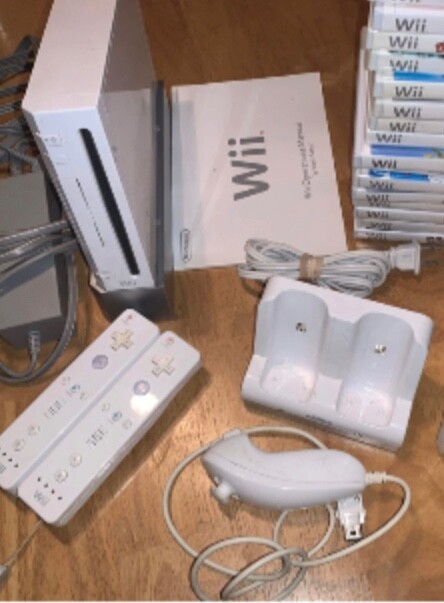 Nintendo Wii Console System Bundle W/ Games And A lot Of Other Accessories. 