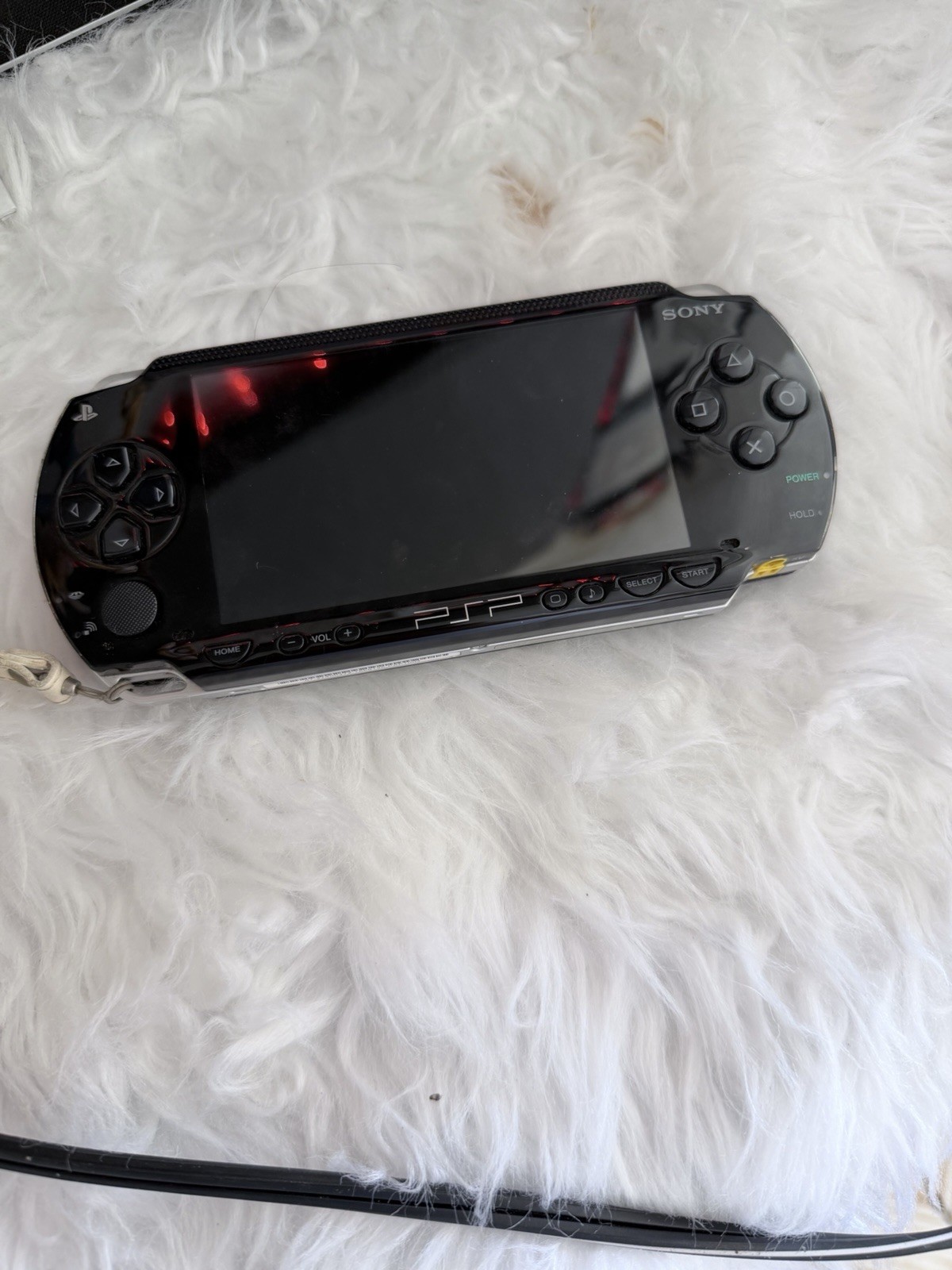 Sony PSP-1001 Handheld Console Black Wi-Fi Capability USB Mini-B Headphone Jack