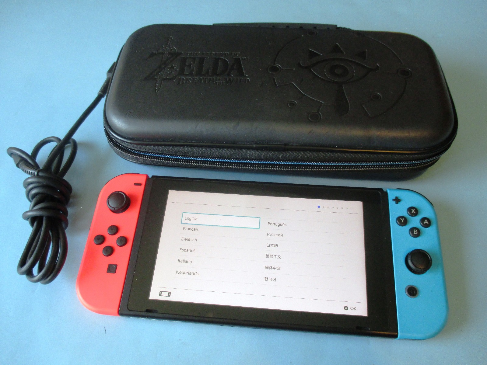Nintendo Switch System Console w/Neon Red & Blue Joy-Cons + Case & Charger