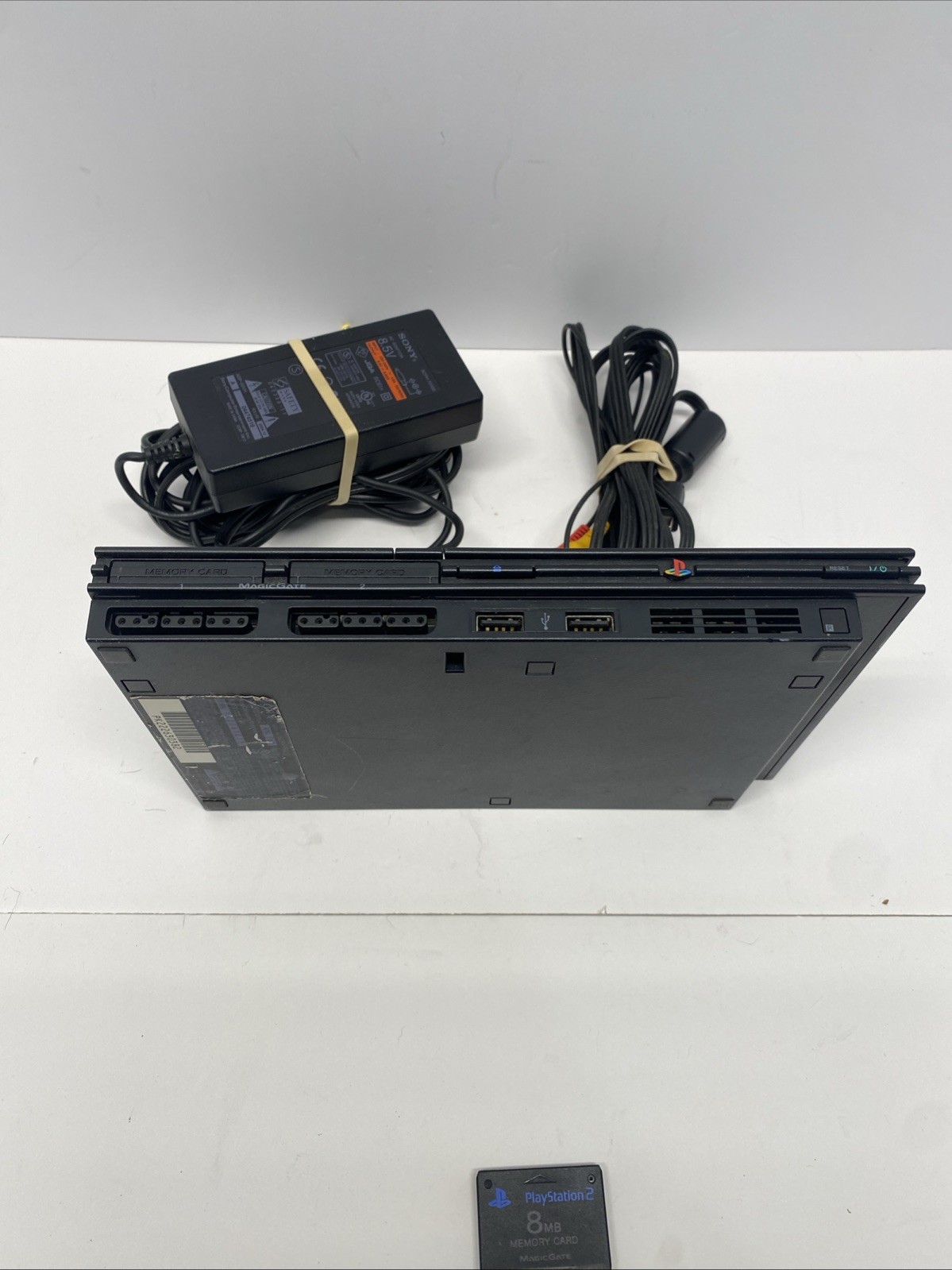 Sony PlayStation 2 Slim Console w/ Power Adapter, AV Cable- Black SCPH-70012