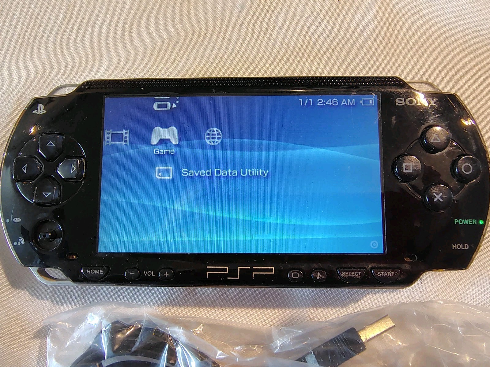 Sony PSP 1001 Black Console With New Battery Charger & Game