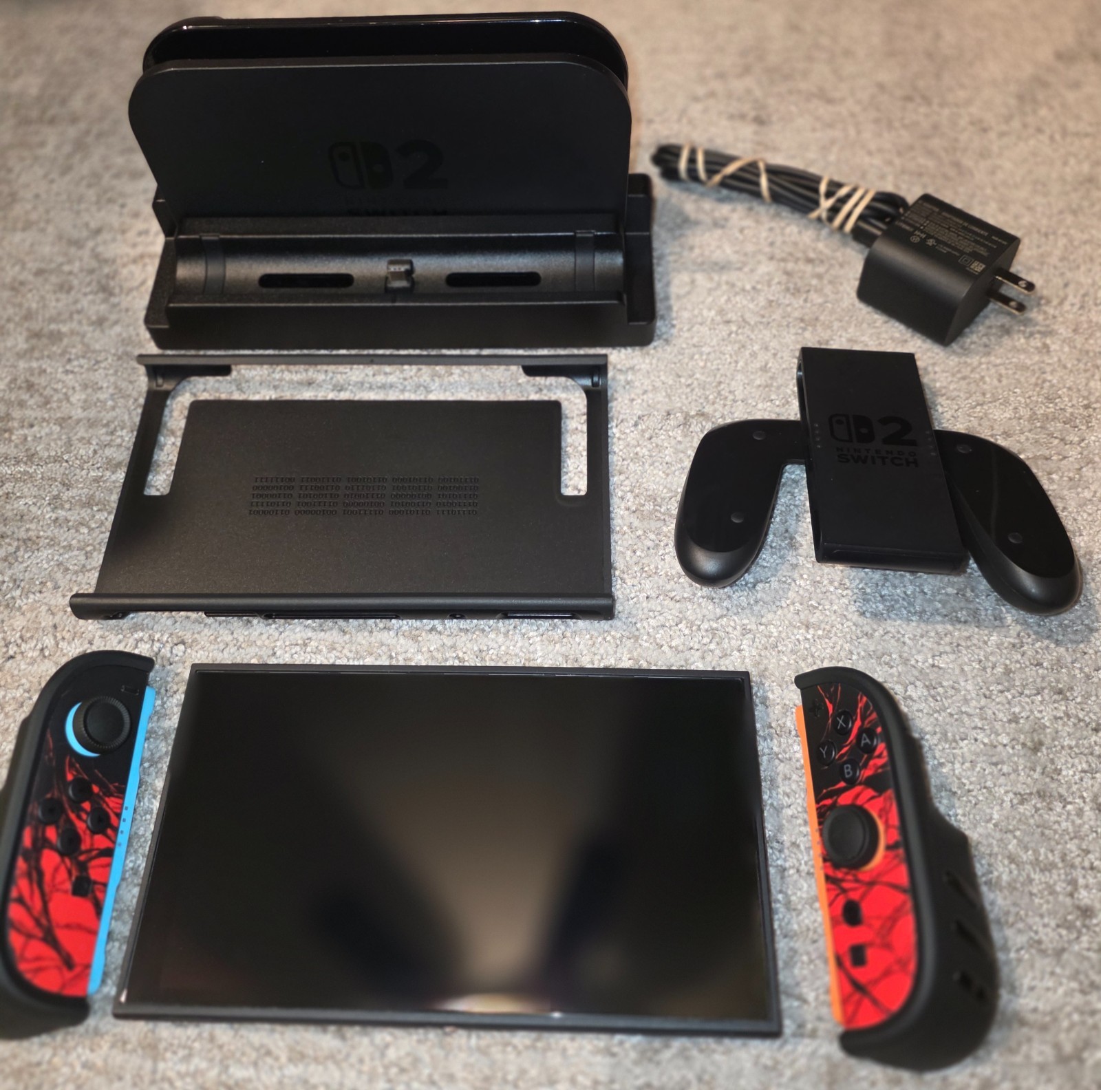 Nintendo Switch 2 with original items PLUS Dbrand skin and killswitch case