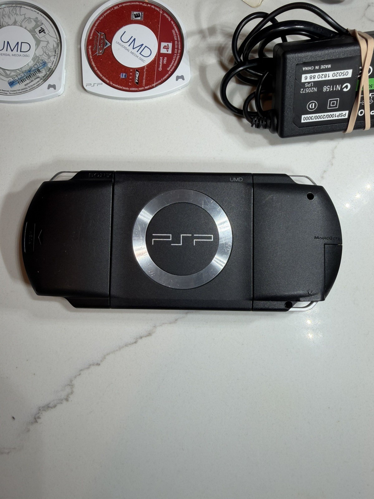 Sony PSP-1001 PlayStation Portable – Black w/ Games + Case + Cables
