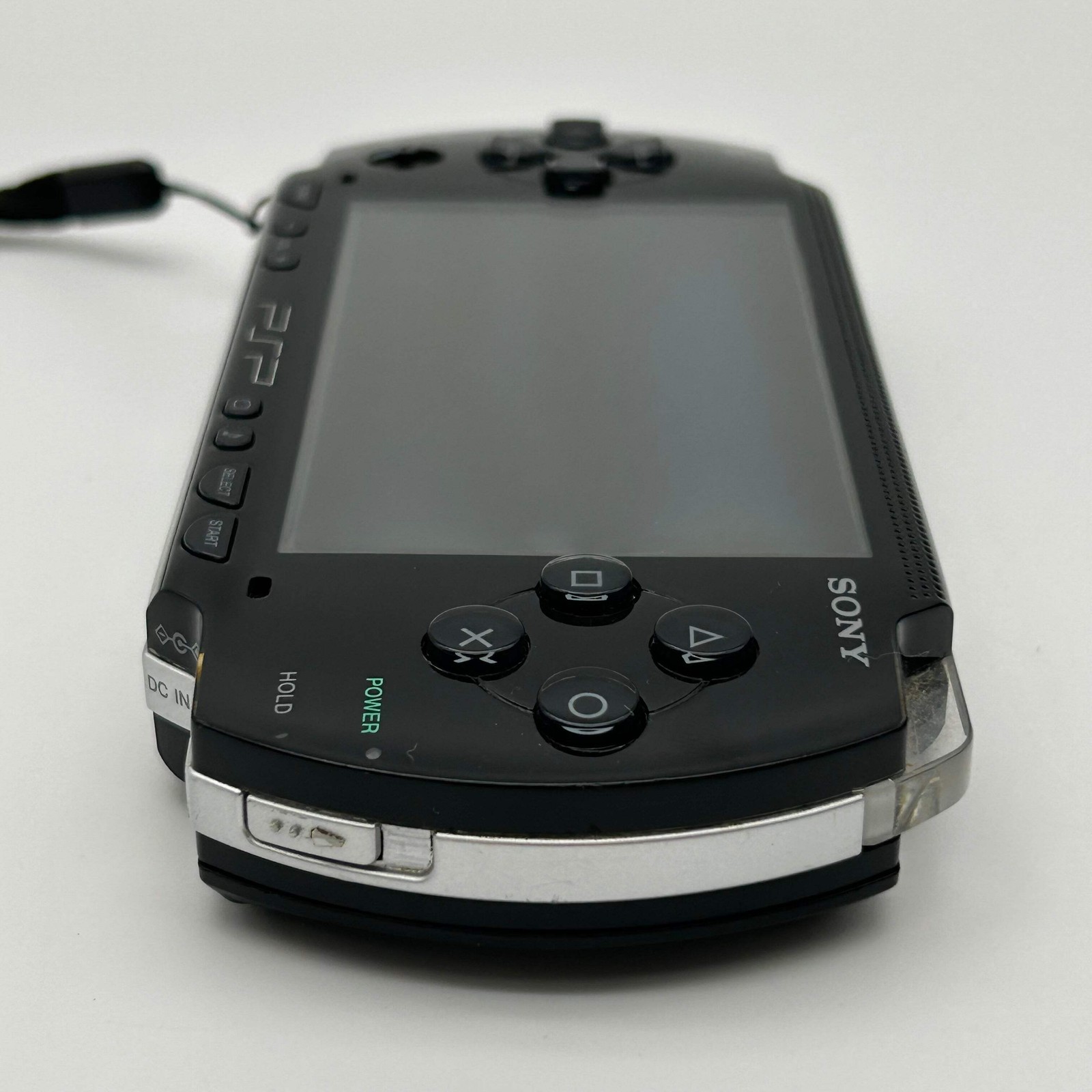 Sony PSP 1001 – 9 Game Bundle | Logitech Amp | Tested / Needs Battery – Used